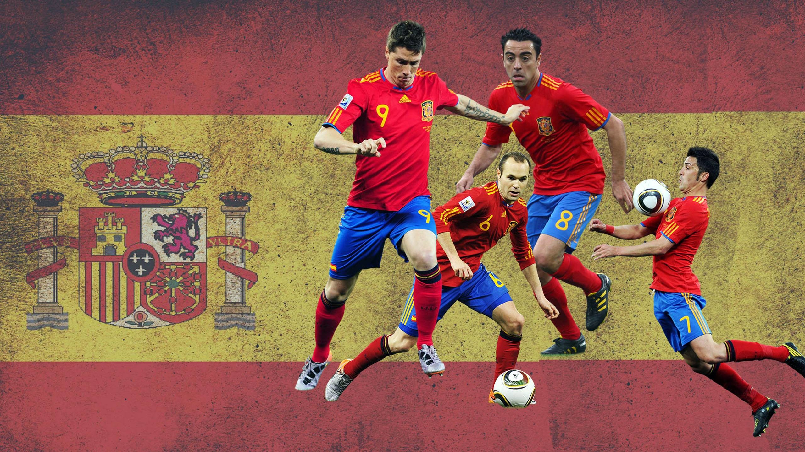 2560x1440 Spain Soccer Team And Flag  wallpaper