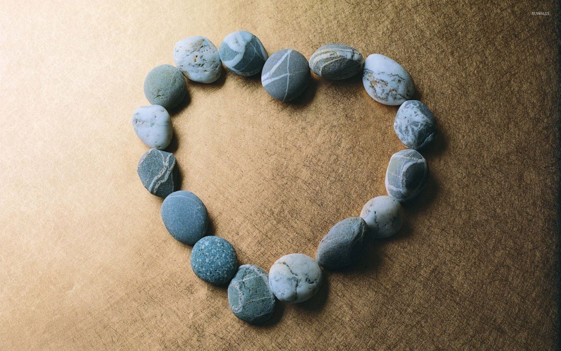 1920x1200 Pebbles shaping a blue heart wallpaper