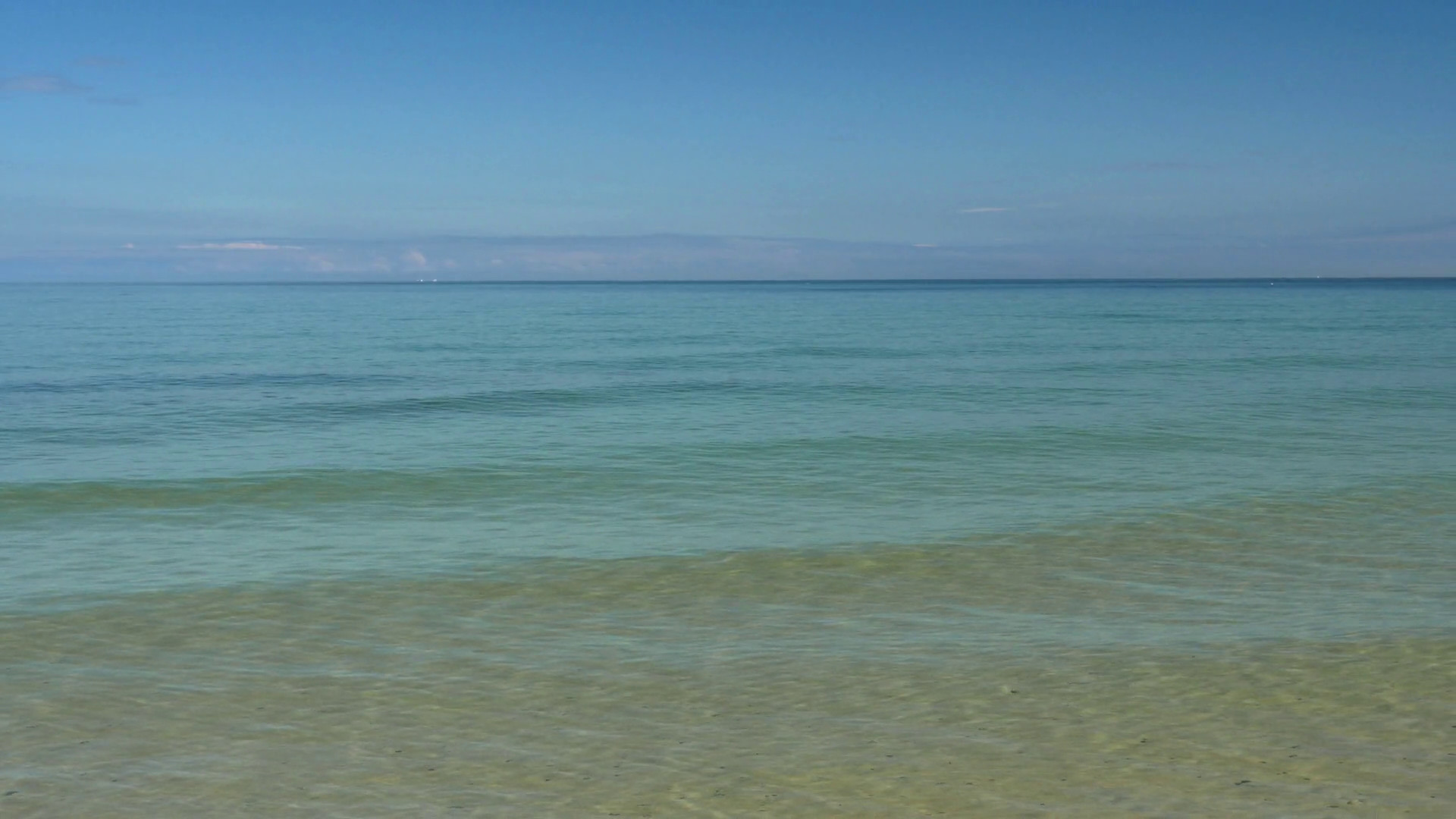 1920x1080 Calm sea and blue sky. Clip contains beach, water, background, calm sea,  smooth water, peaceful, relaxing, beautiful, blue, sea Stock Video Footage  - ...