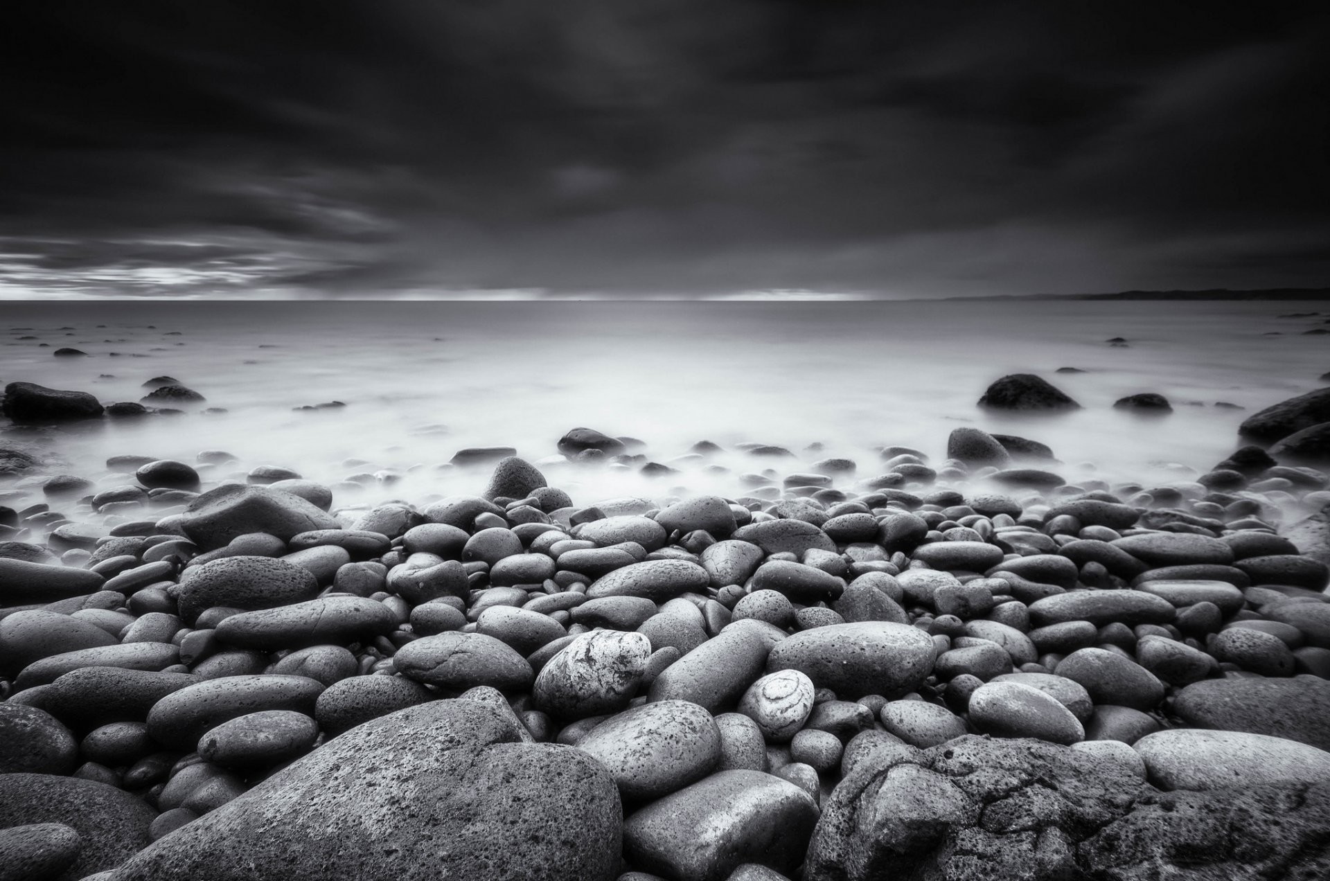 1920x1272 raglan waikato nz beach black-and- white photo beach stones