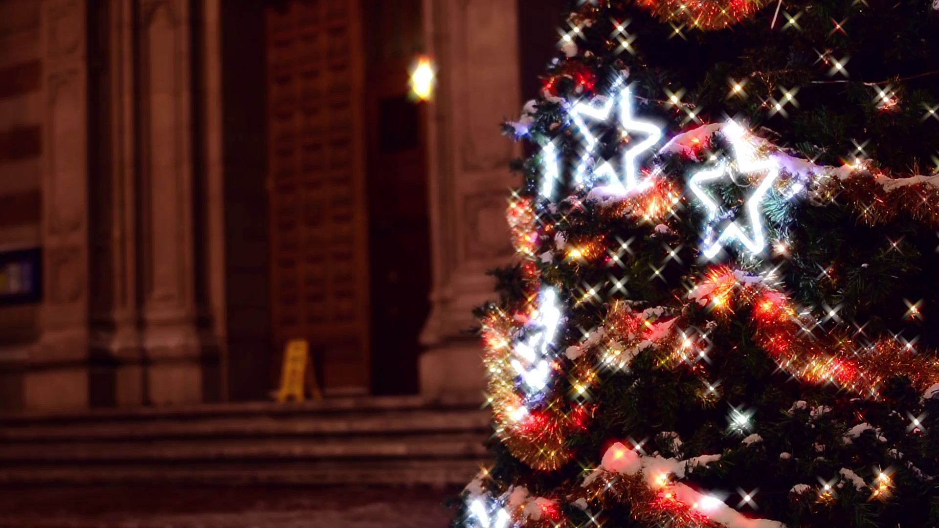 1920x1080 Sparkling lights on Christmas tree in garden of Catholic church, background  Stock Video Footage - Storyblocks Video