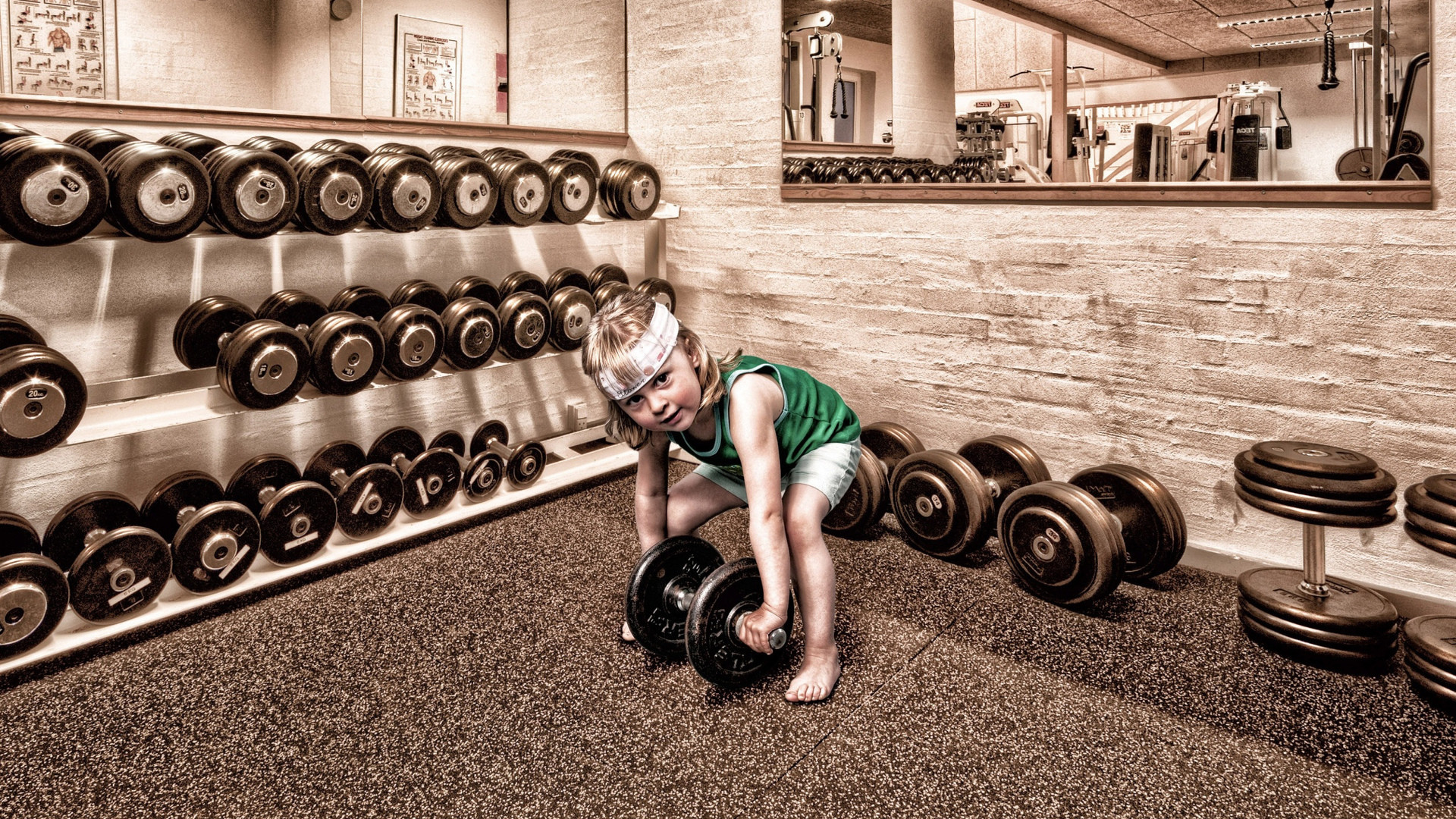 1920x1080 Kid with dumbbells in the gym: