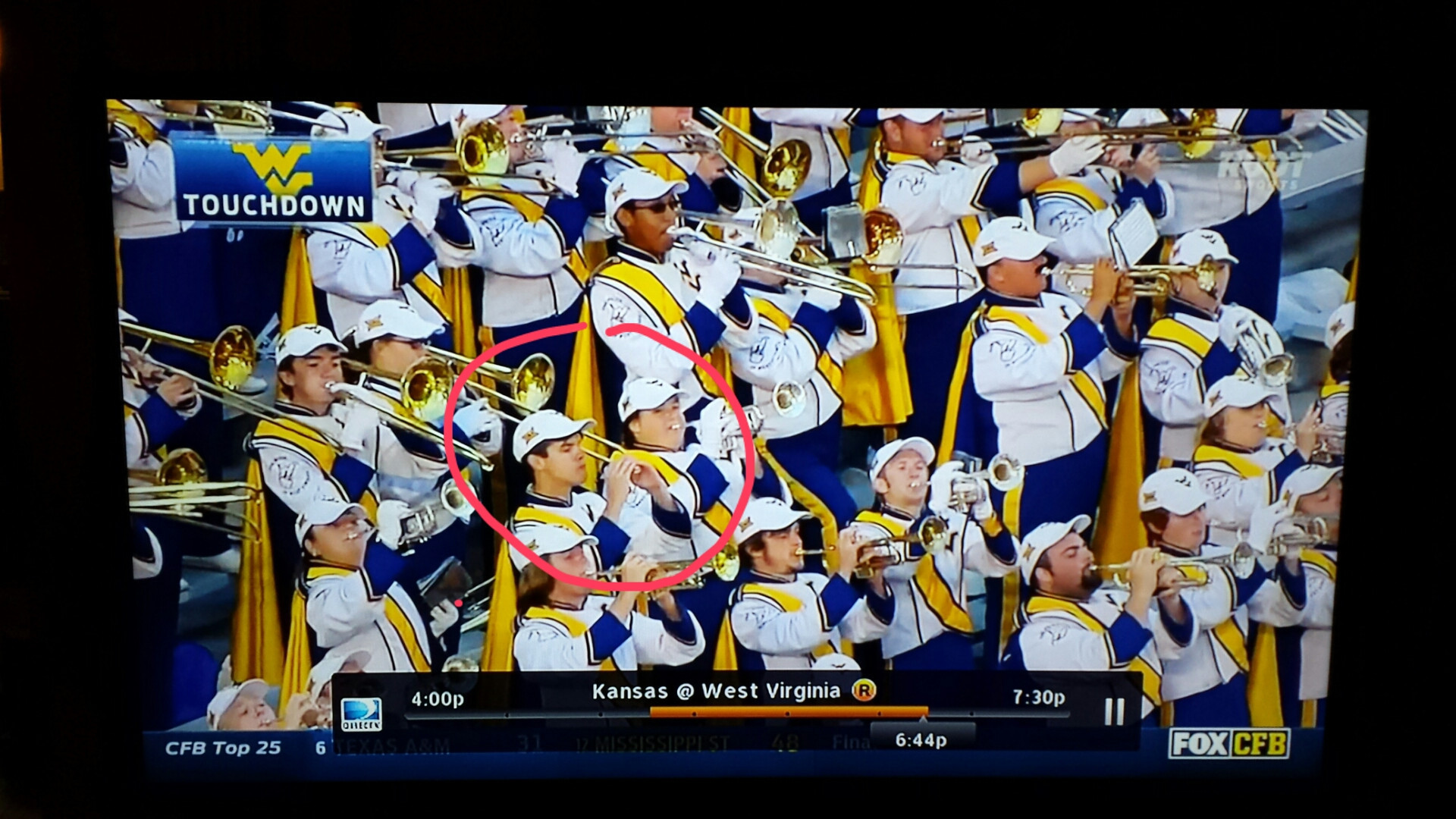 1920x1080 west virginia band member pretends to play trumpet...eats sandwich instead  ...