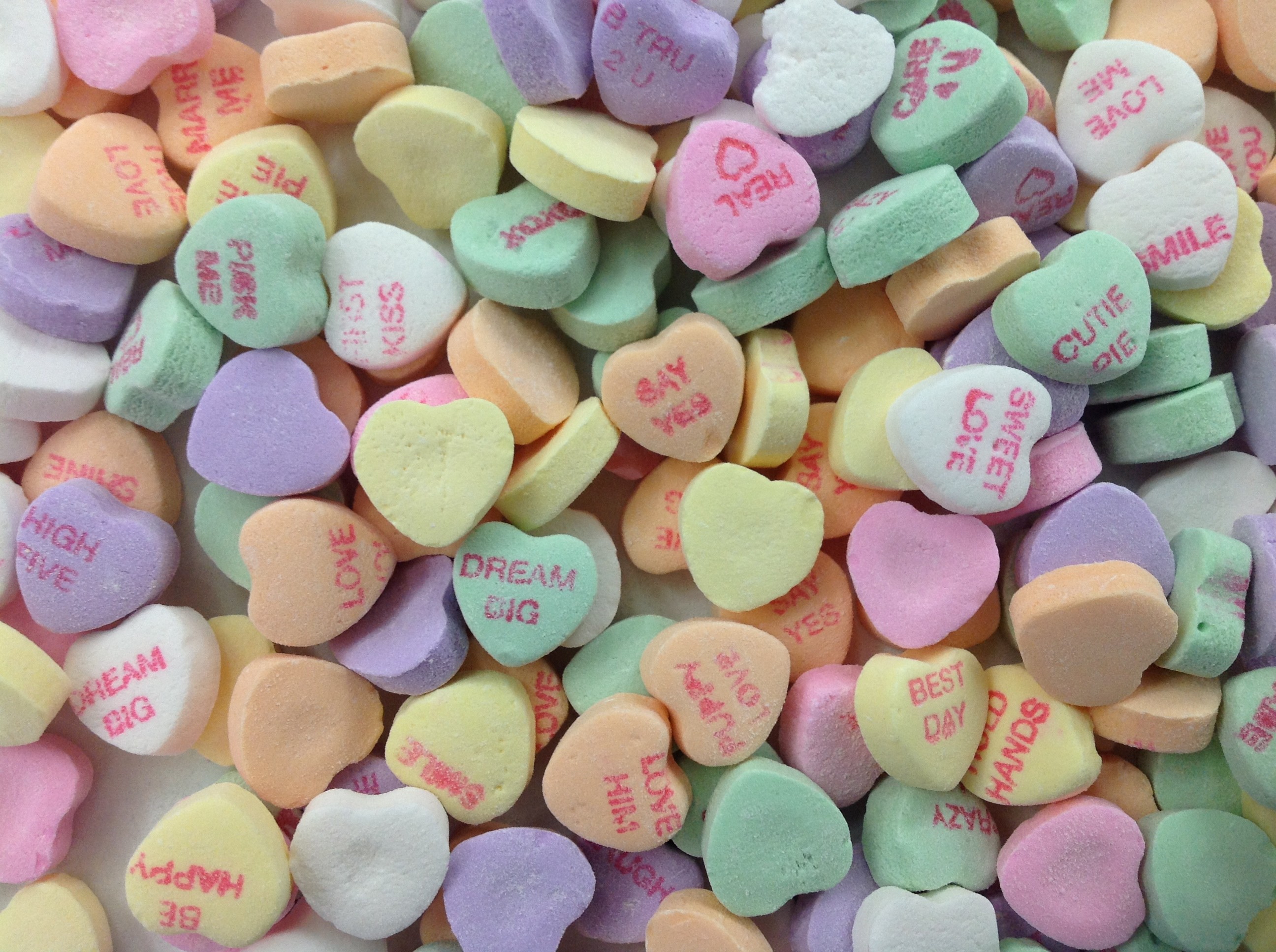 HD wallpaper candy hearts red background romantic full frame large  group of objects  Wallpaper Flare
