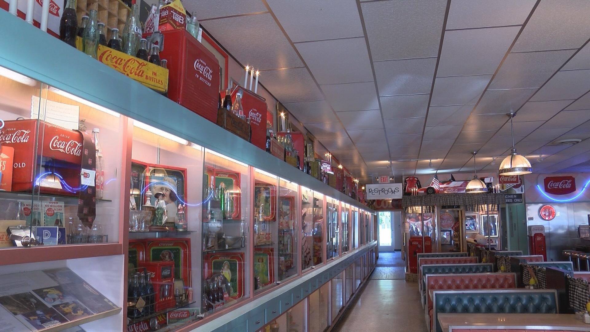 1920x1080 Walls lined with Coca-Cola memorabilia inside Dawson and Stevens Classic 50's  Diner.