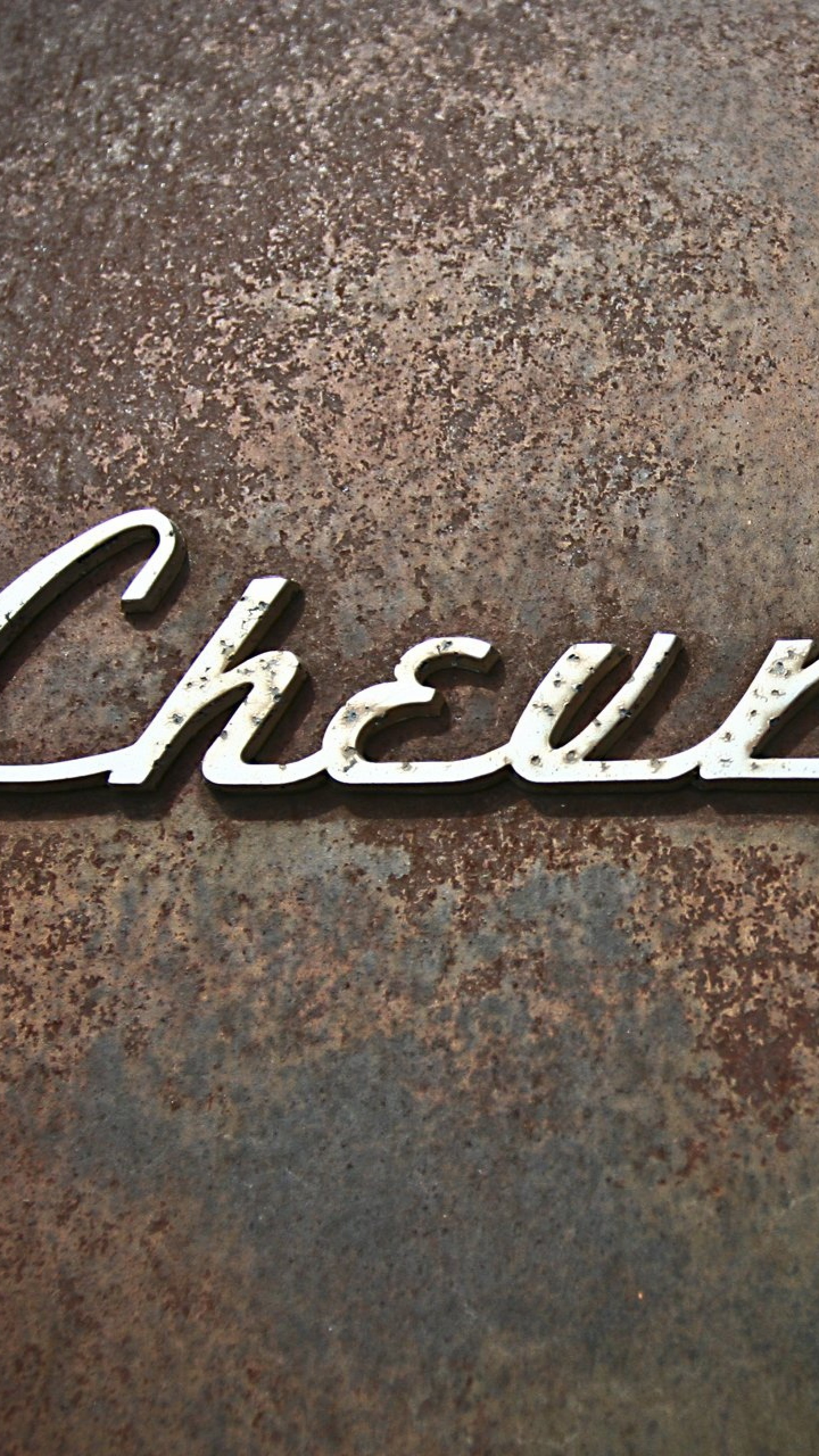1440x2560  Wallpaper chevrolet, logo, rust