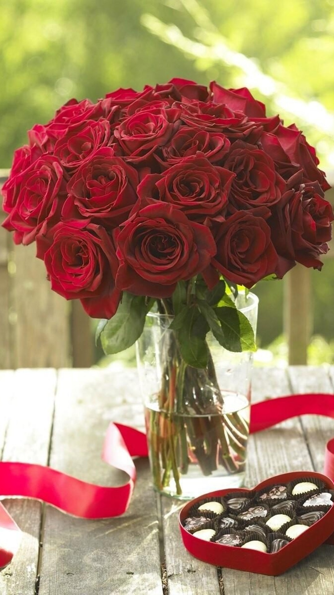 1080x1920  Wallpaper roses, flowers, bouquet, candy, heart, ribbon, veranda