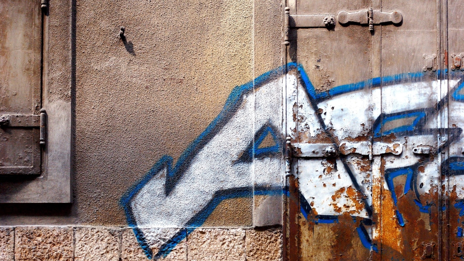 1920x1080 Preview wallpaper wall, rust, city, graffiti, lettering 