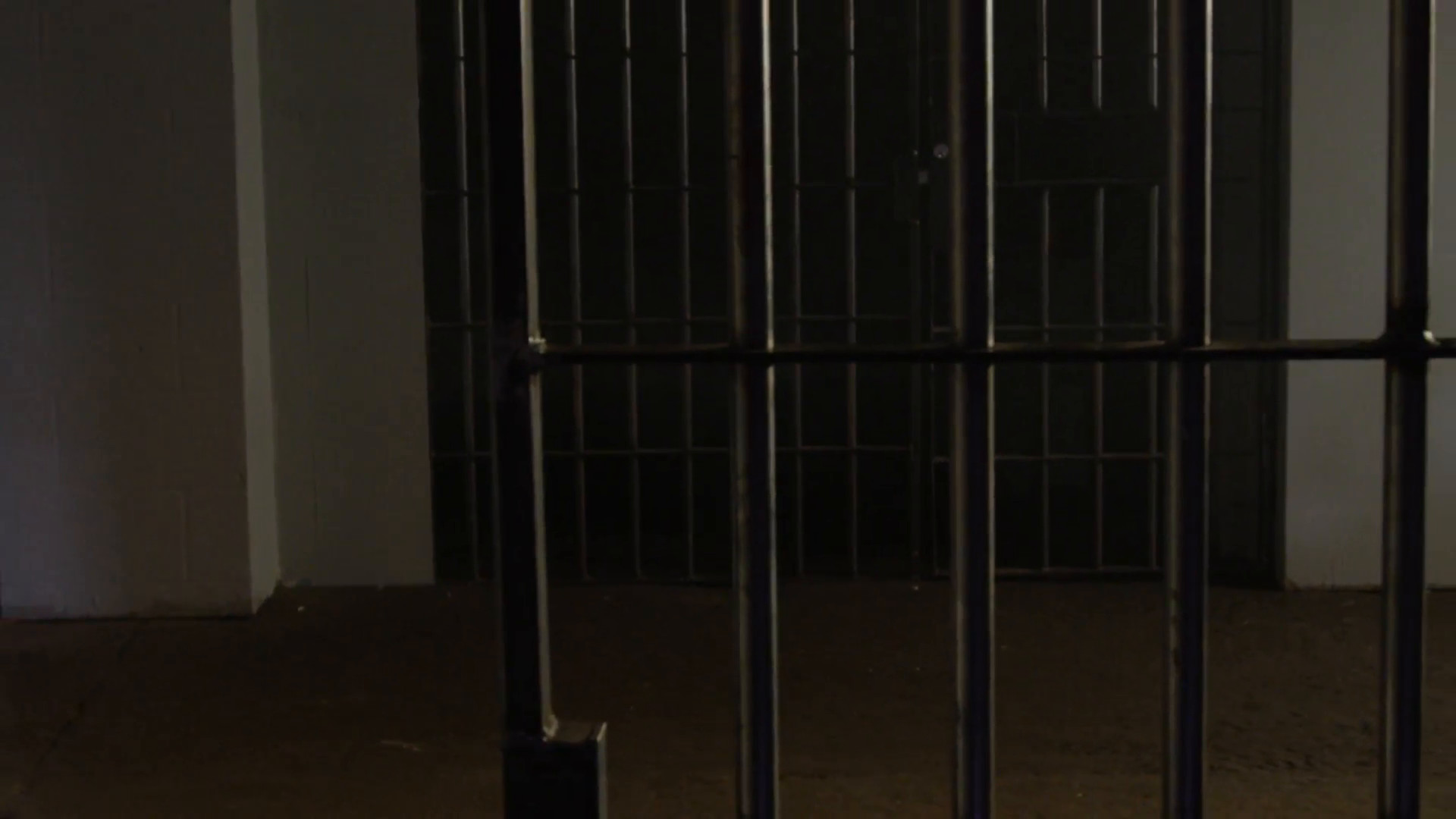 1920x1080 Zoom out to reveal prison cell from inside Stock Video Footage - VideoBlocks