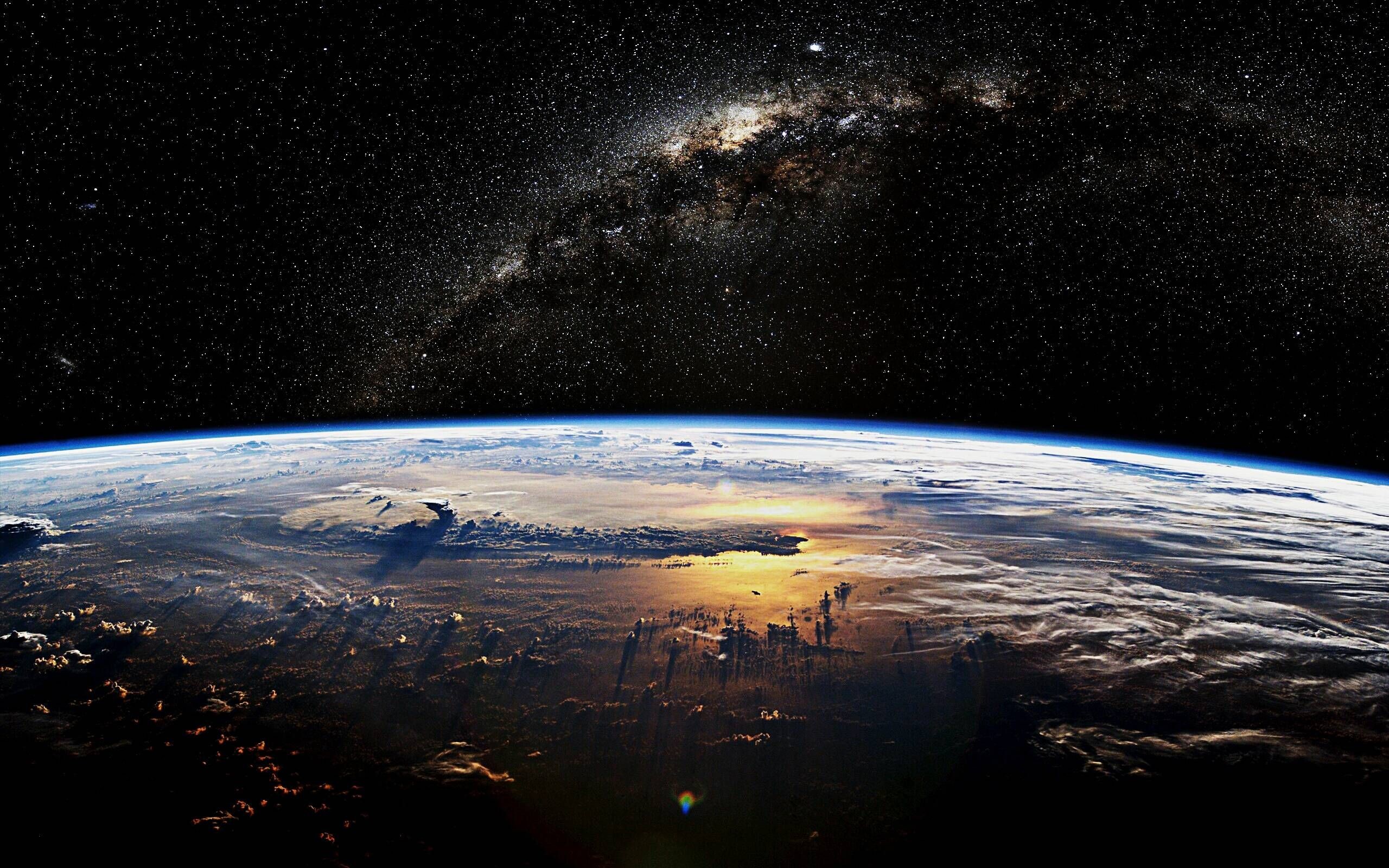 2560x1600 See time move from day to night from space, along the Earth's Terminator.