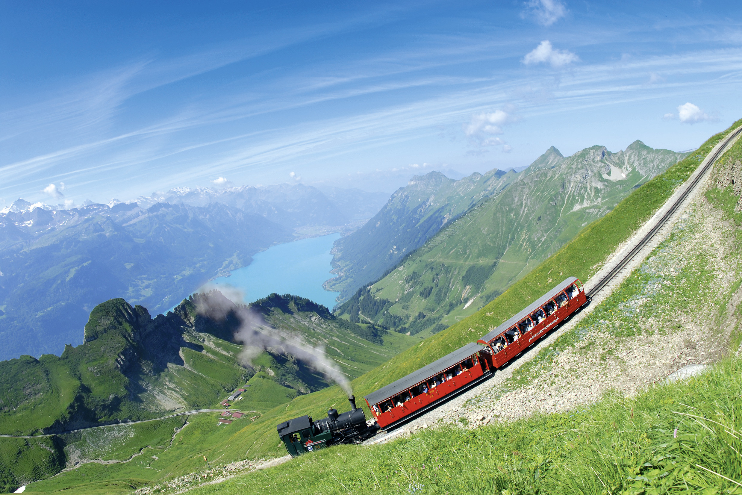 2478x1653 A Train Going Up in the Mountains in Switzerland