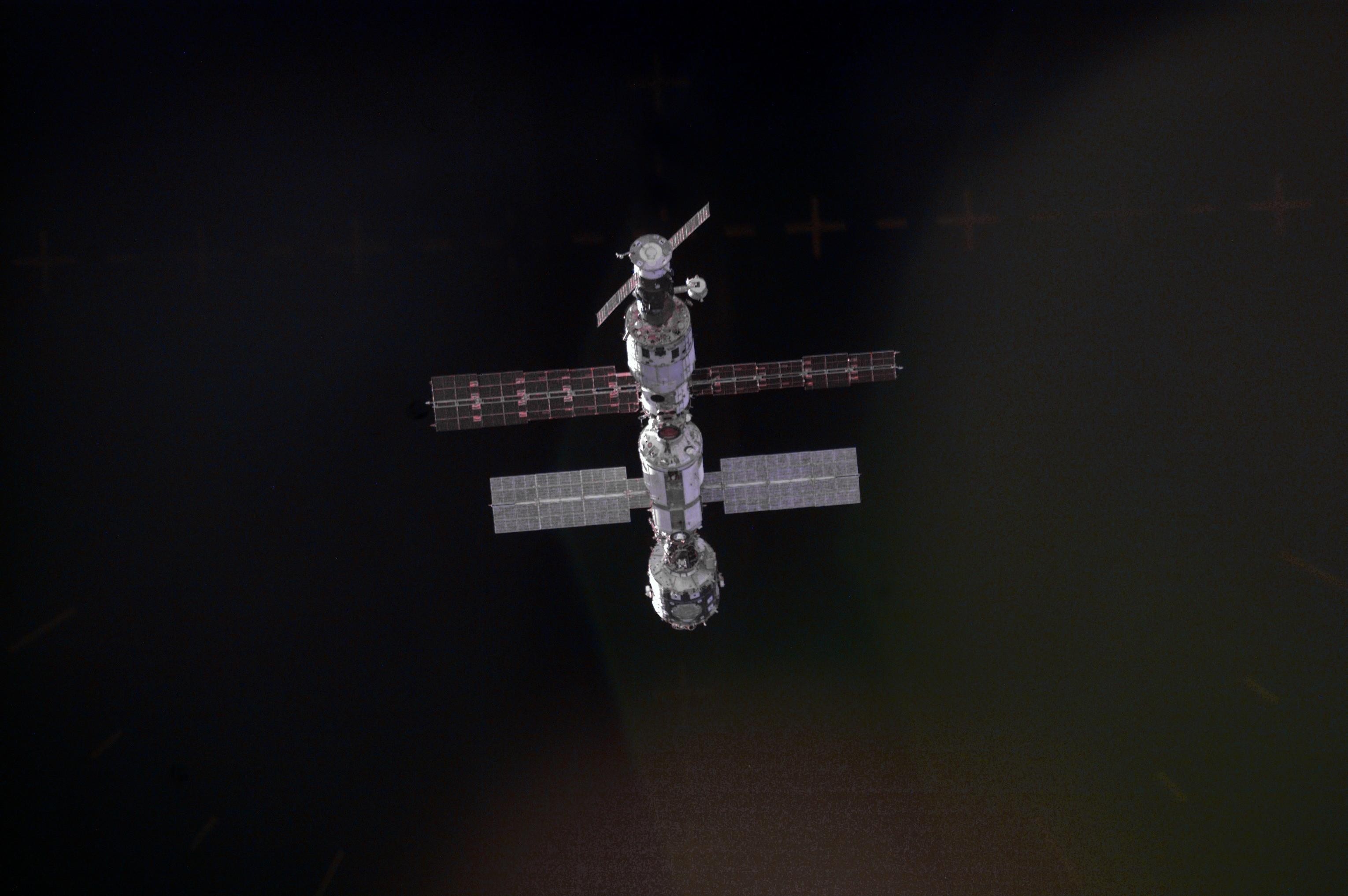 3060x2035 wallpaper The international space station in dark space.