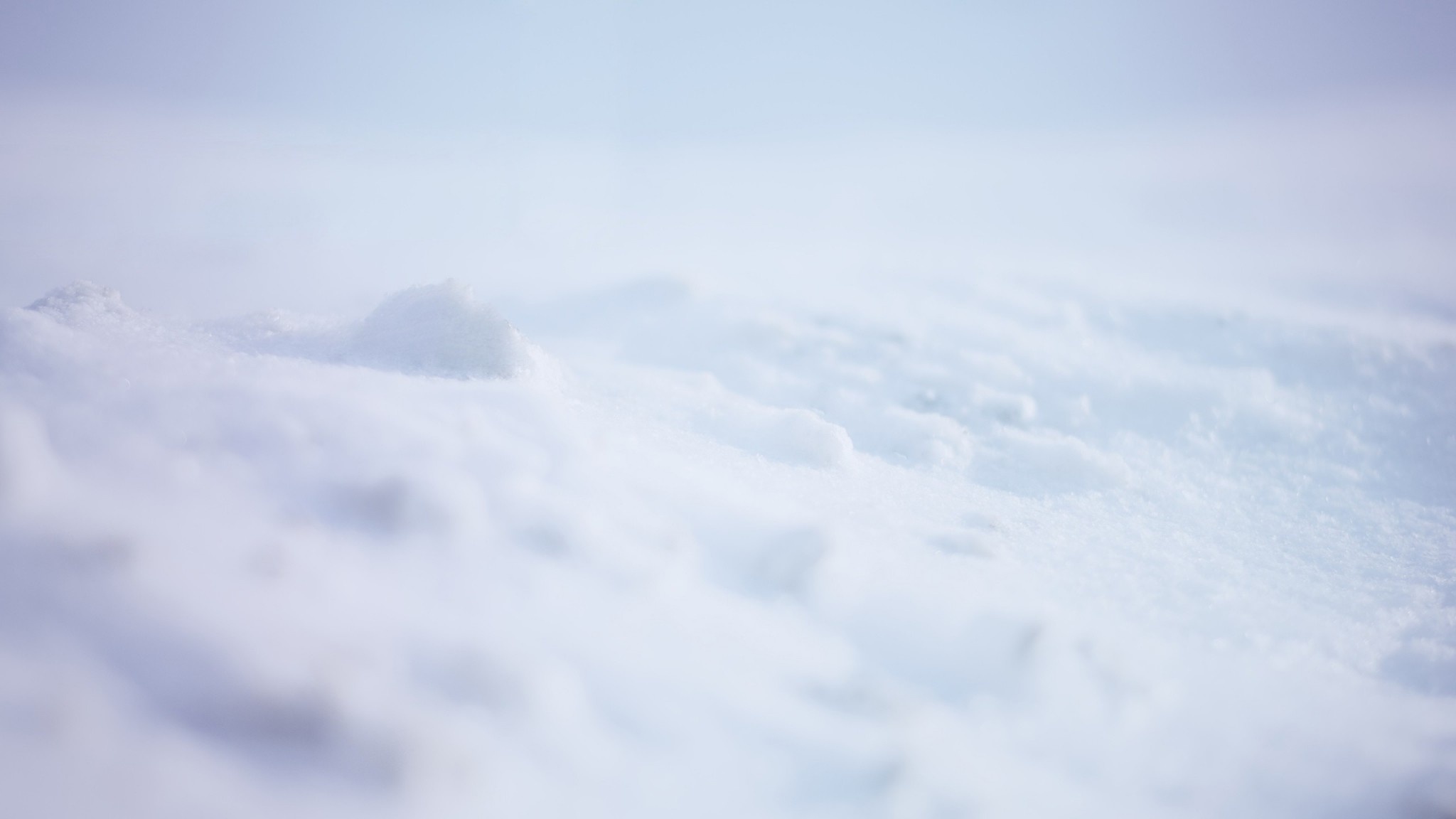 2048x1152  Wallpaper snow, white, background, surface