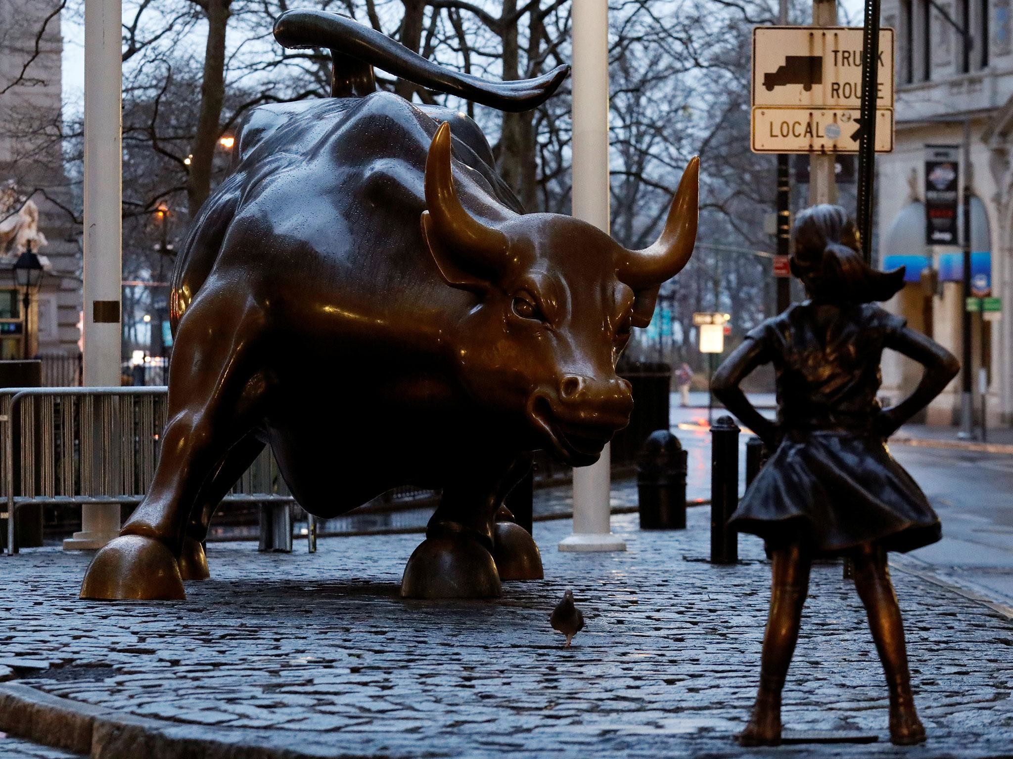 2048x1536 Young girl stares down Wall Street's charging bull on International Women's  Day | The Independent