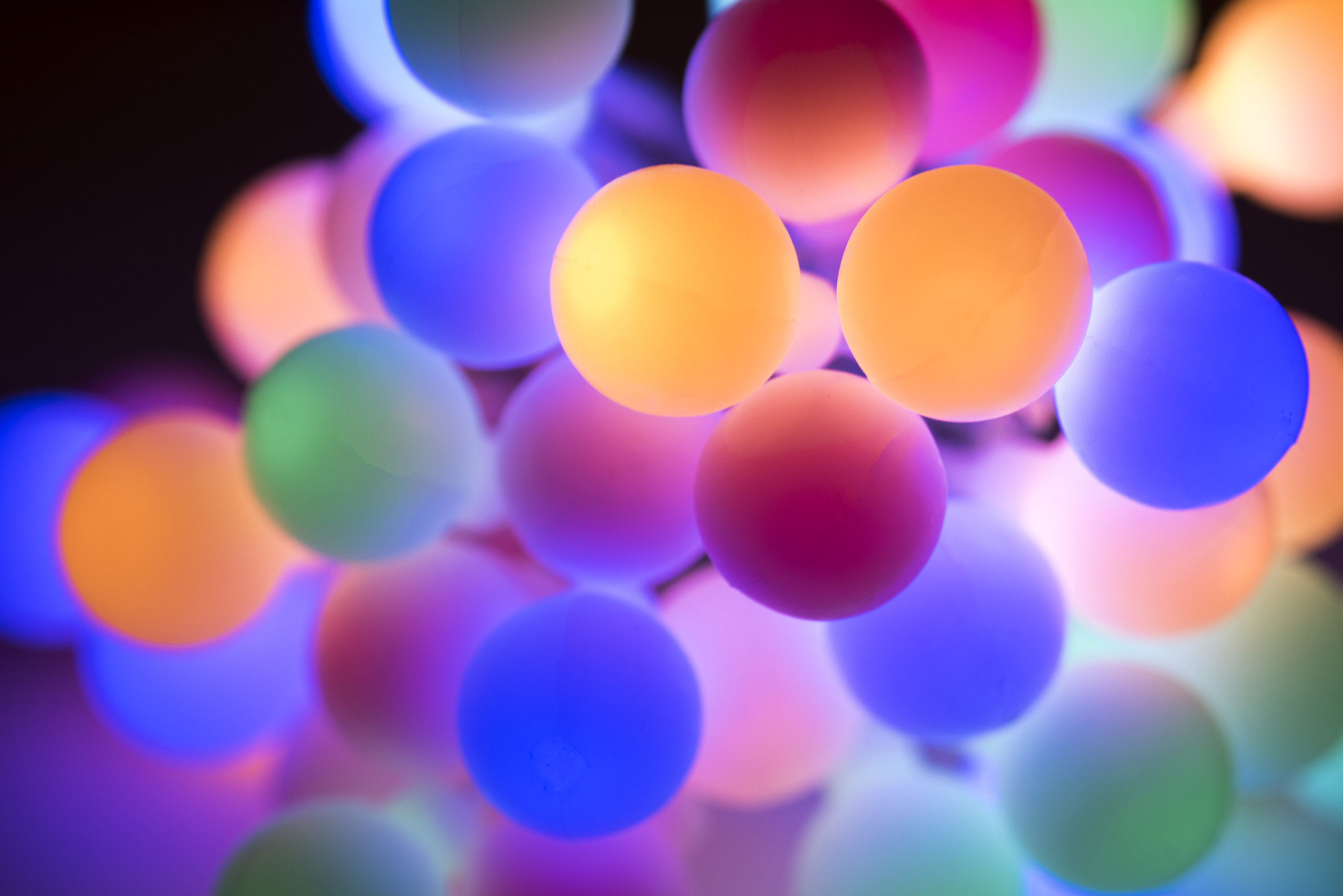 3000x2002 Abstract and defocused background composed of round glowing christmas lights