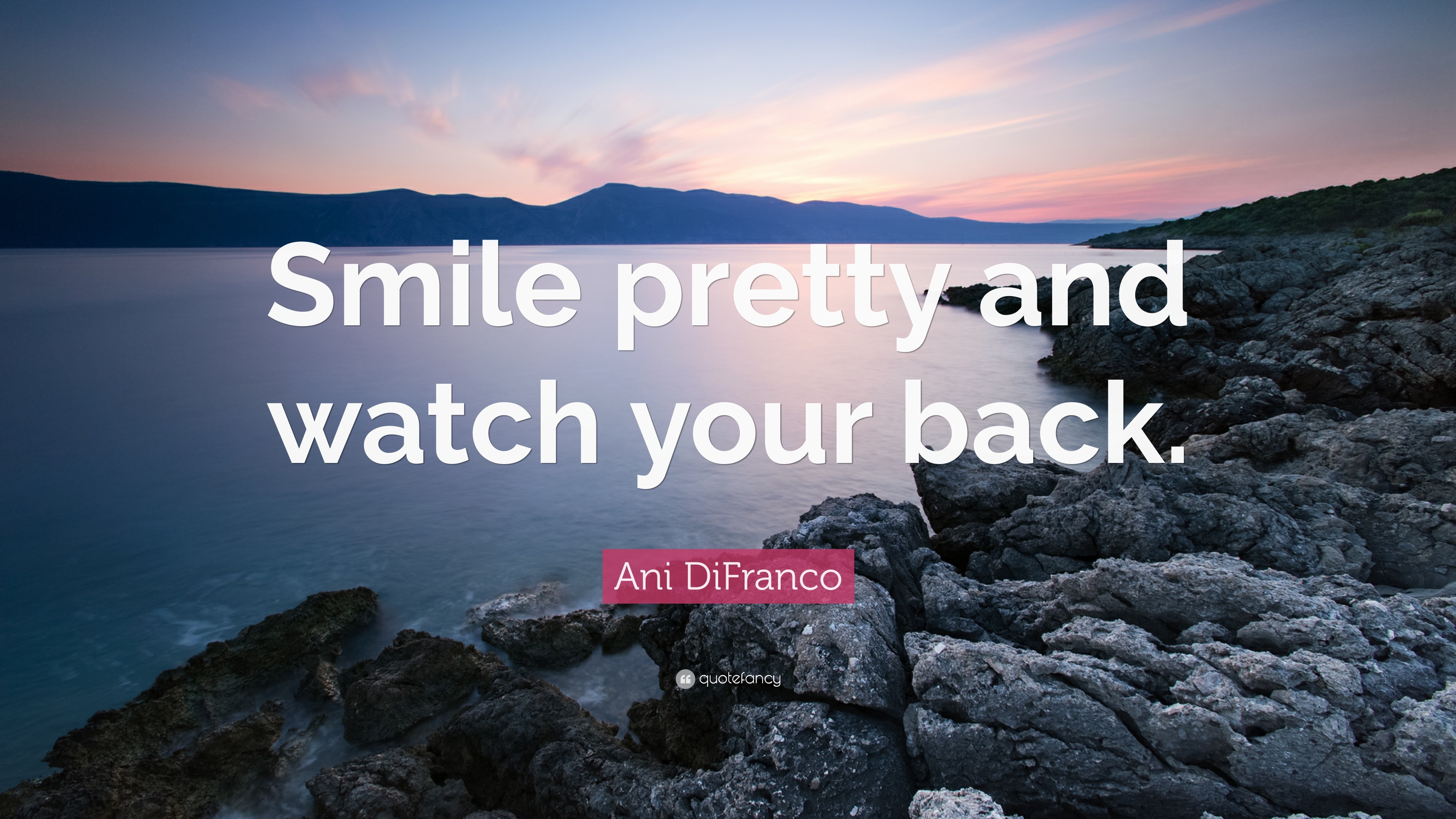 3840x2160 Ani DiFranco Quote: “Smile pretty and watch your back.”