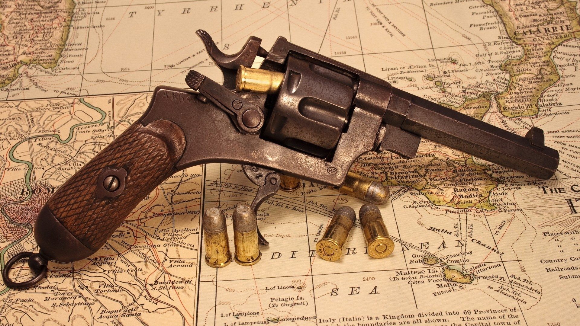 1920x1080 Revolver and Map Wallpaper