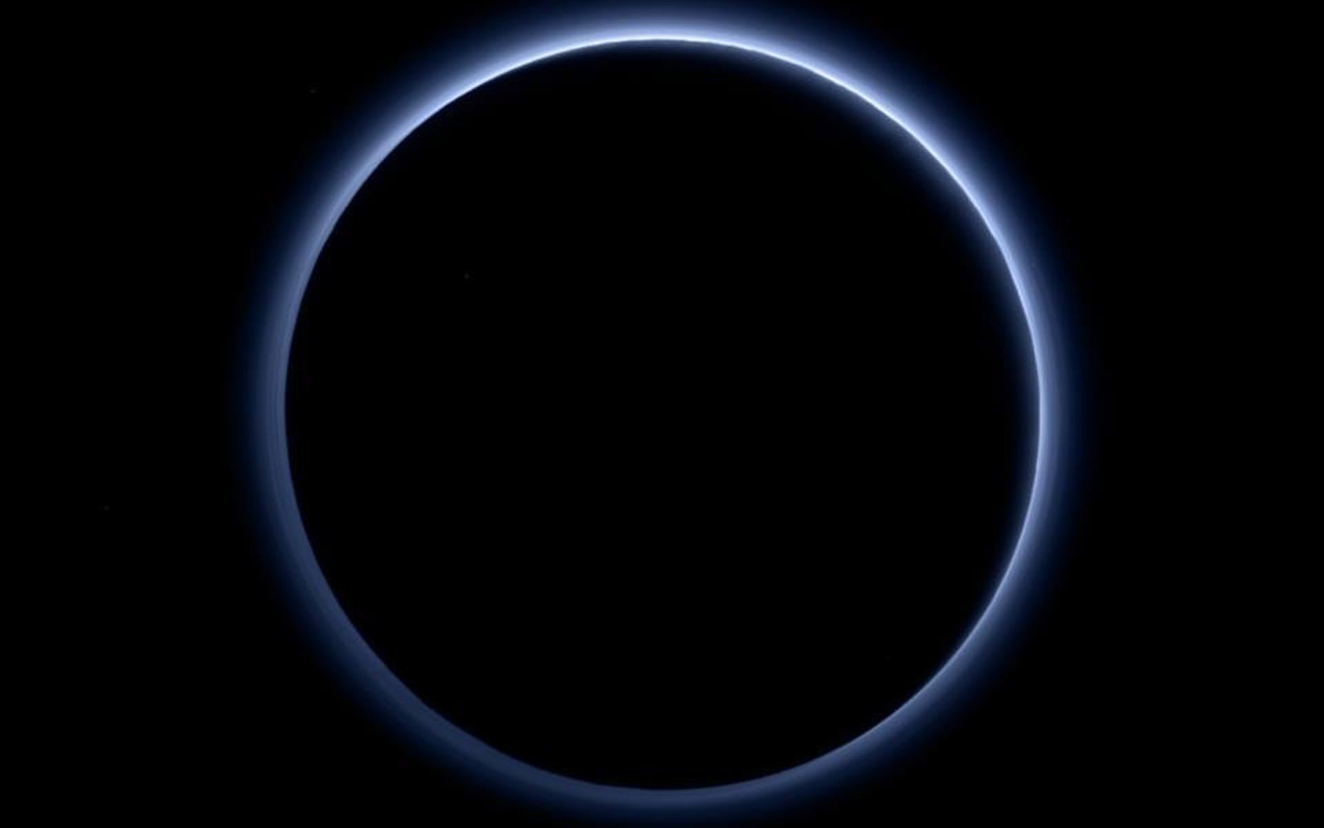 1920x1200 Pluto's haze layer shows its blue color in this picture taken by NASA's New  Horizons.