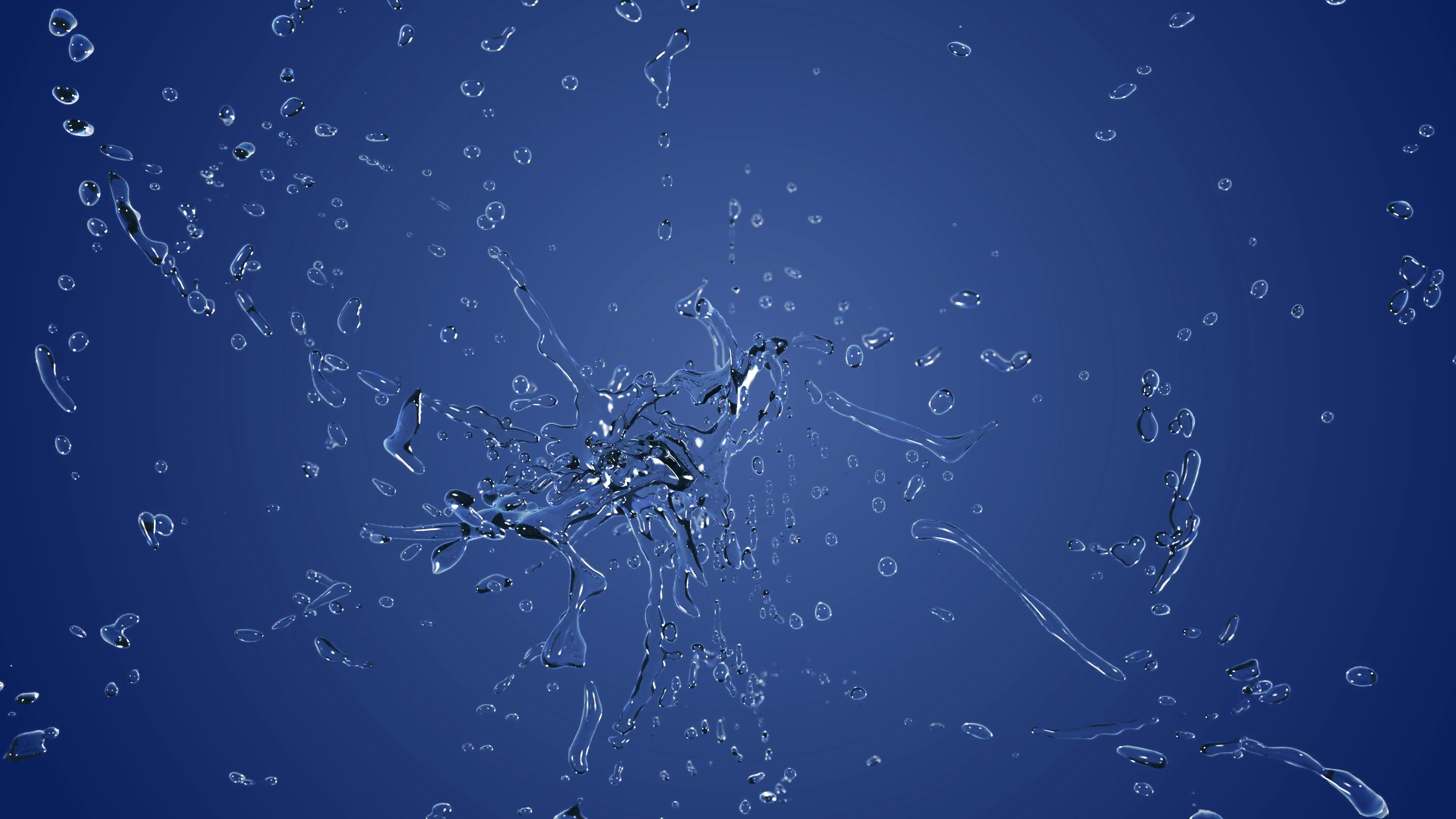 3840x2160 The splashing water explosion on blue background. Liquid in slow motion.  Alpha channel mask included. 4K Motion Background - VideoBlocks