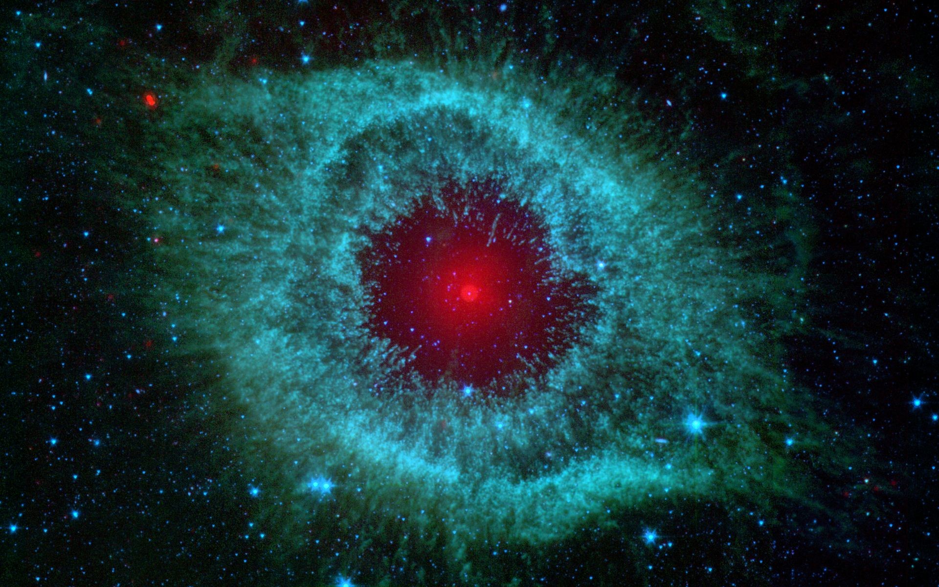 1920x1200 This infrared image from NASA's Spitzer Space Telescope shows the Helix  nebula, a cosmic starlet