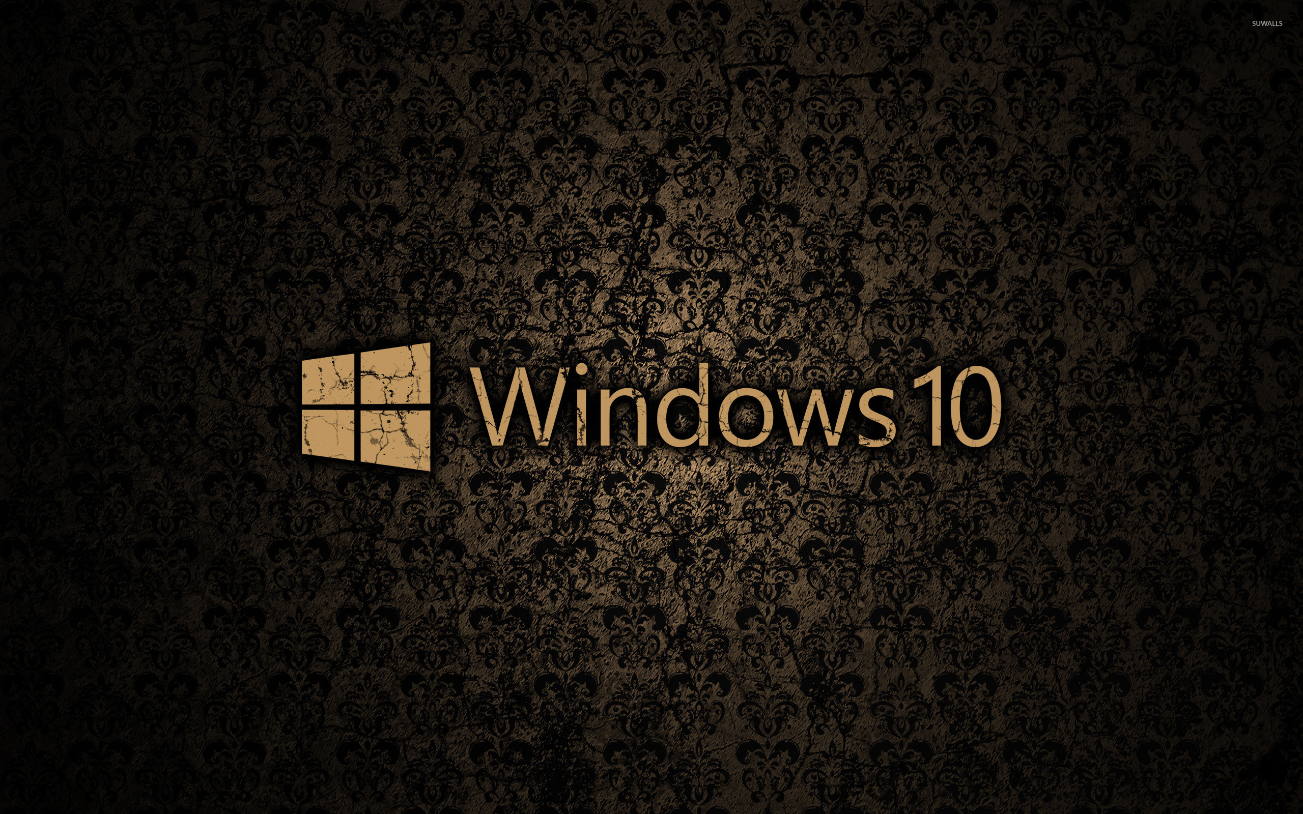2560x1600 Windows 10 text logo on a cracked wall wallpaper