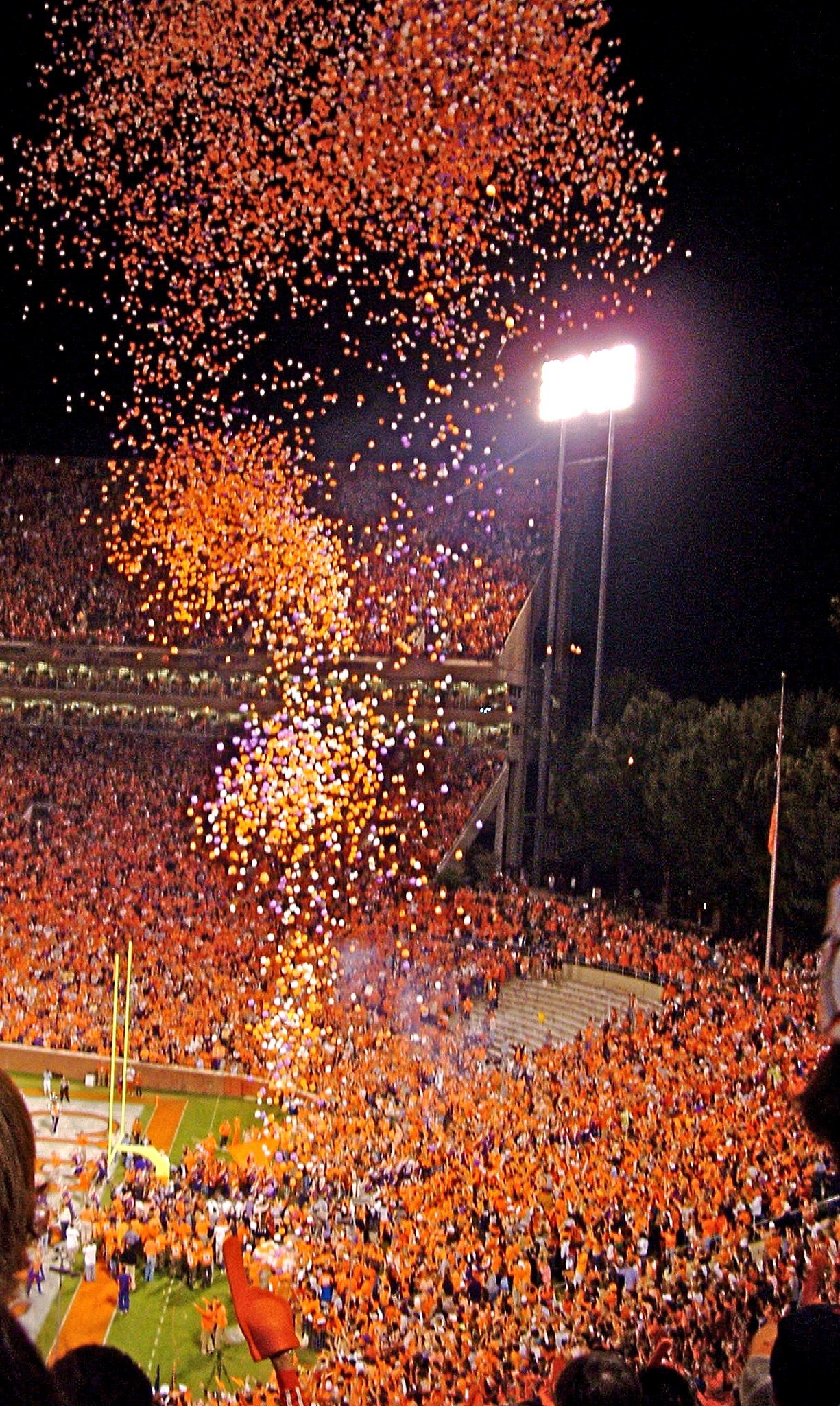 1225x2048 Orange balloons at a home game for Clemson University in South Carolina