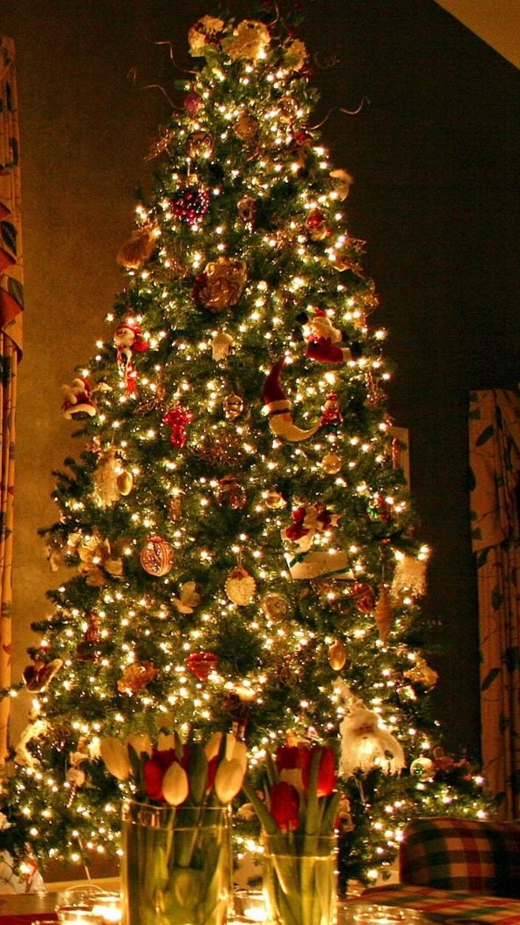 2160x3840  Wallpaper christmas tree, ornaments, fireplace, christmas  decorations, flowers, home,