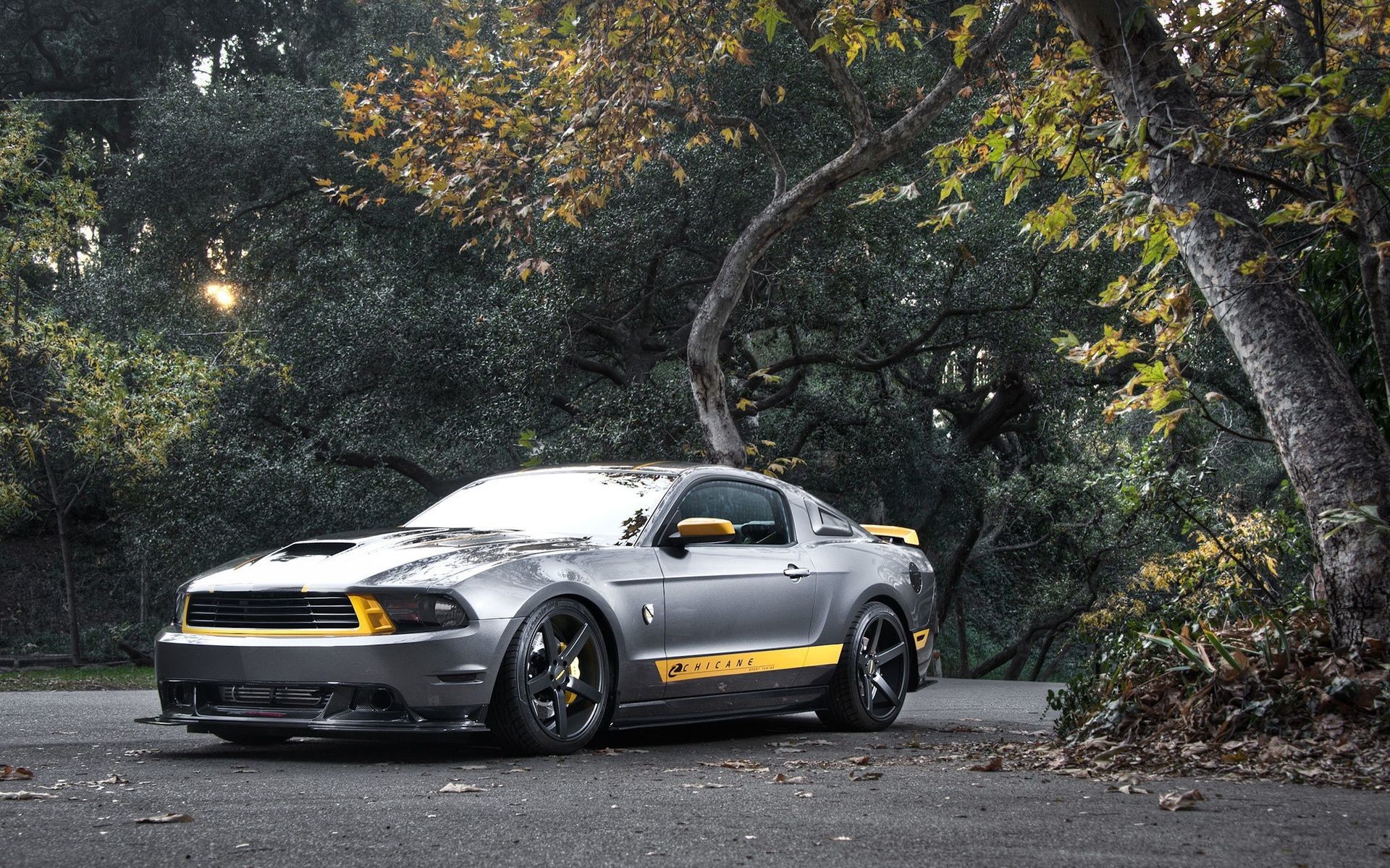 1920x1200 2011 - Ford Mustang GT riding on Vossen wheels.