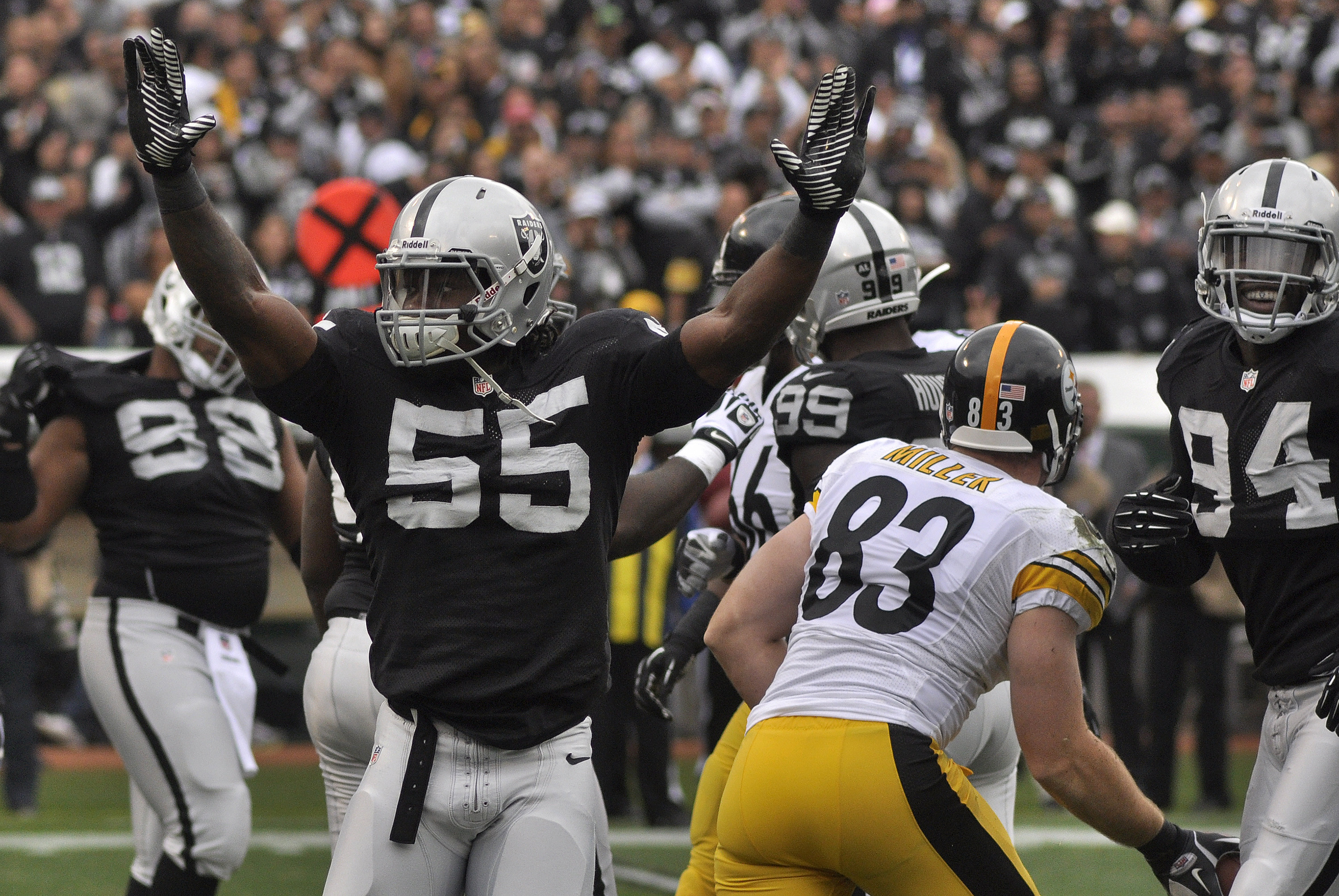 3000x2009 Oakland Raiders linebacker Sio Moore (55) celebrates after a tackle against  the Pittsburgh Steelers