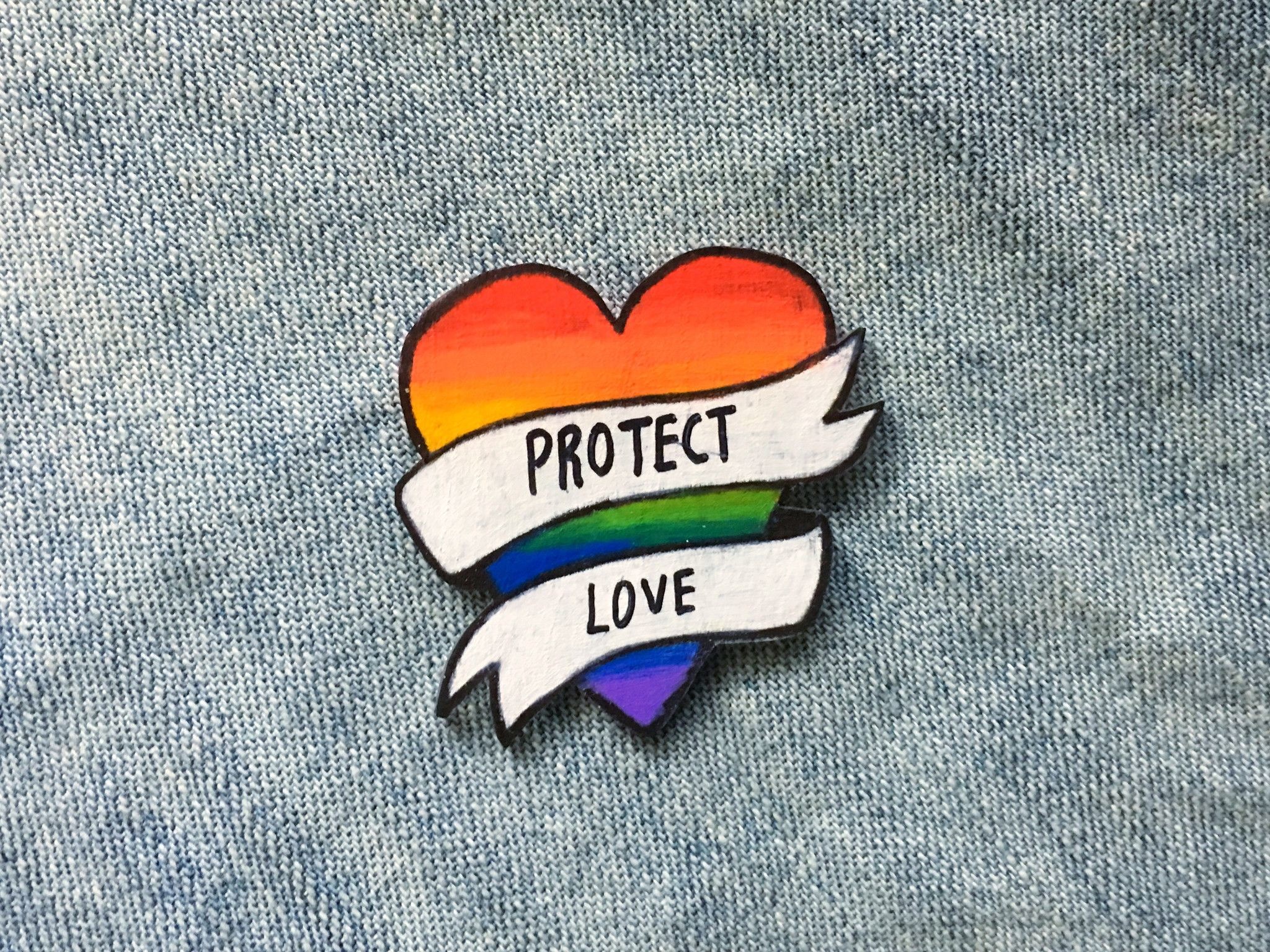 2048x1536 LGBT Rainbow Heart Pin with "Protect Love" Banner
