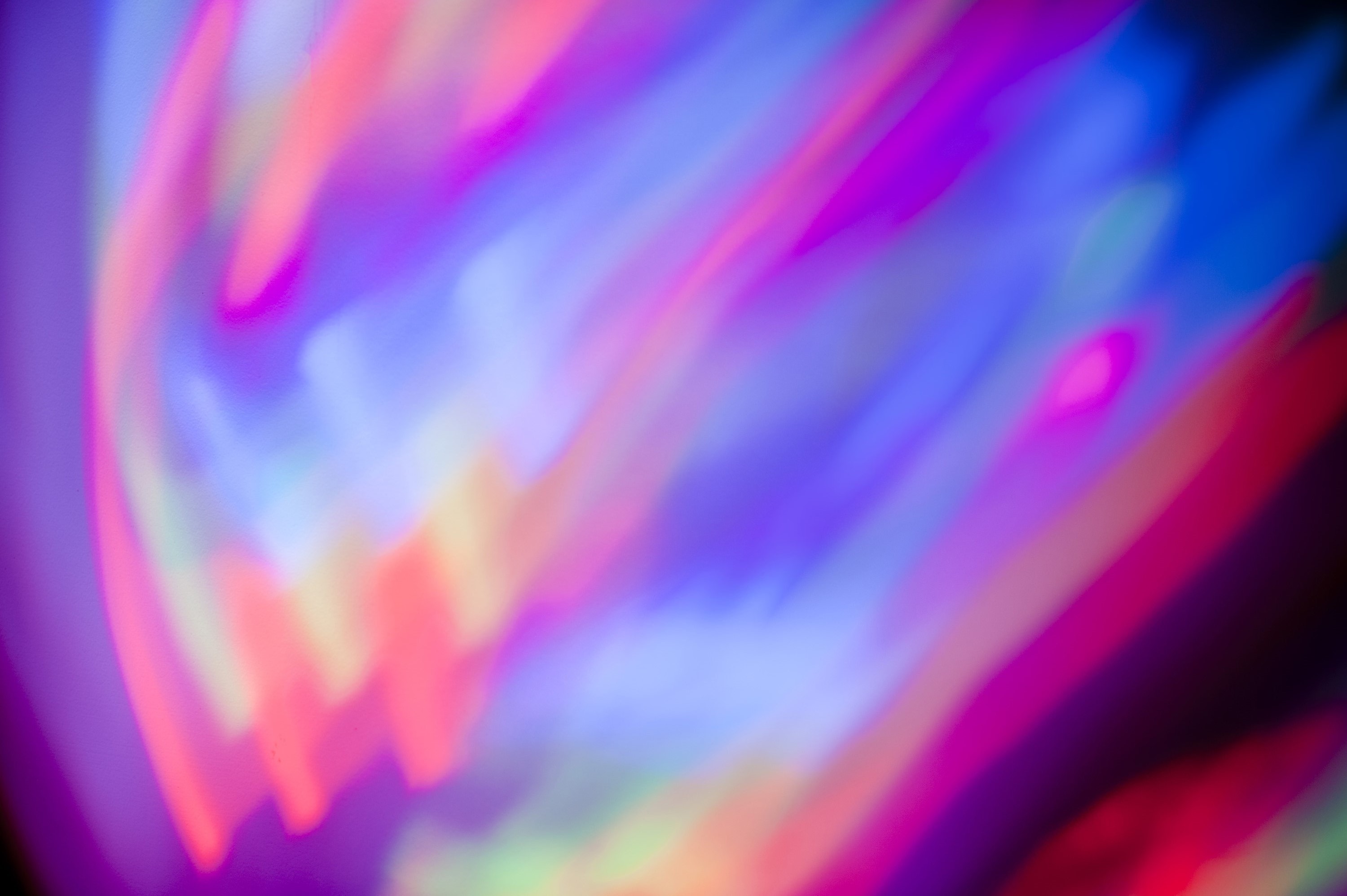 3000x1996 abstract pattern formed by mixing red and blue lights