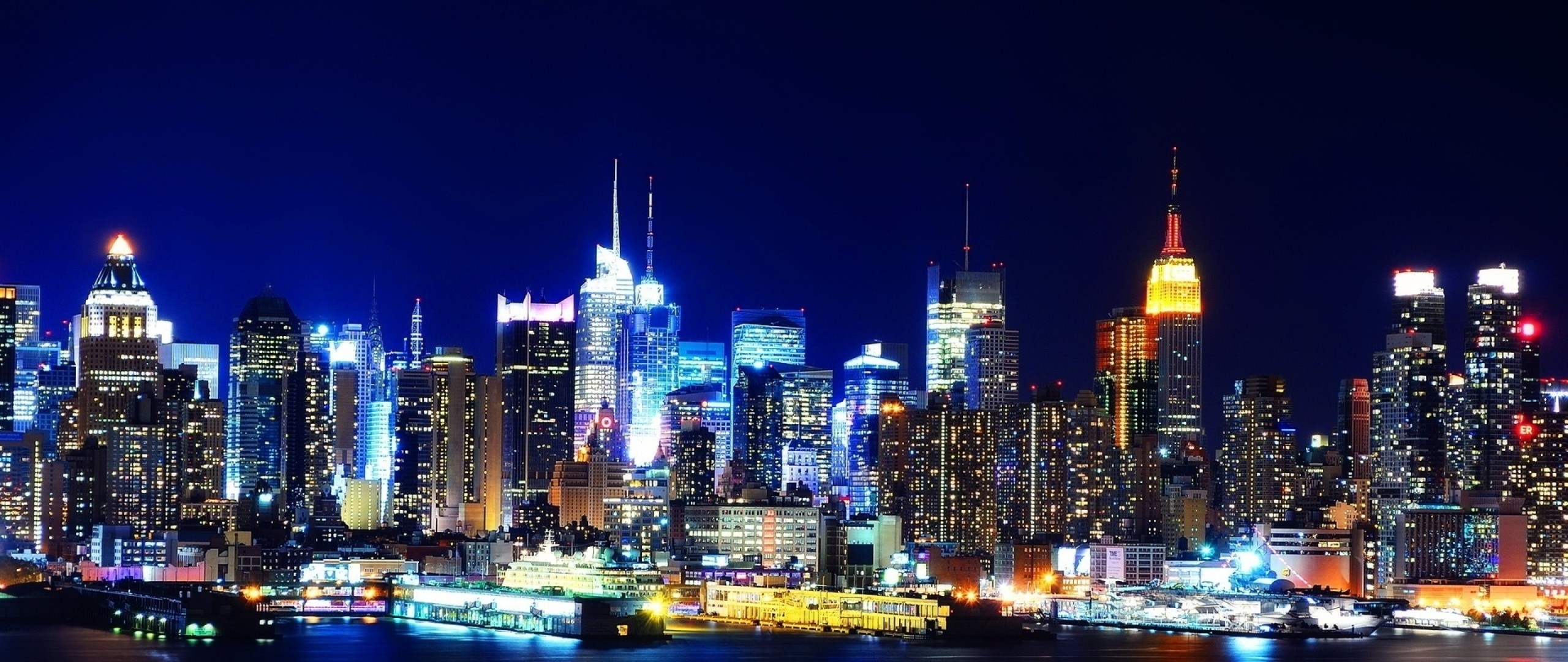 2560x1080 Preview wallpaper new york, night, lights, river, reflection 