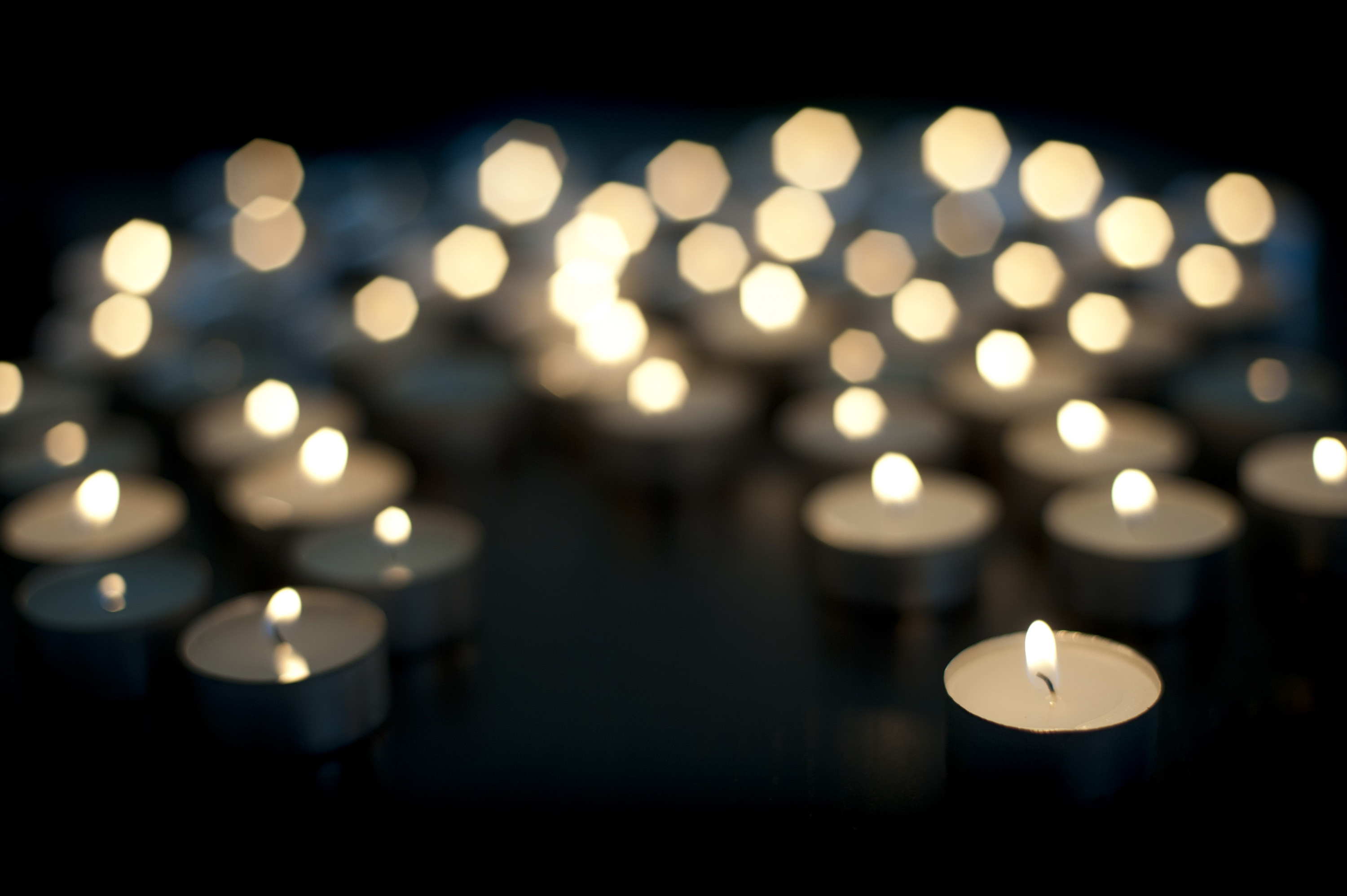 3000x1996 background image of out of focus christmas trealight candles with space of  text