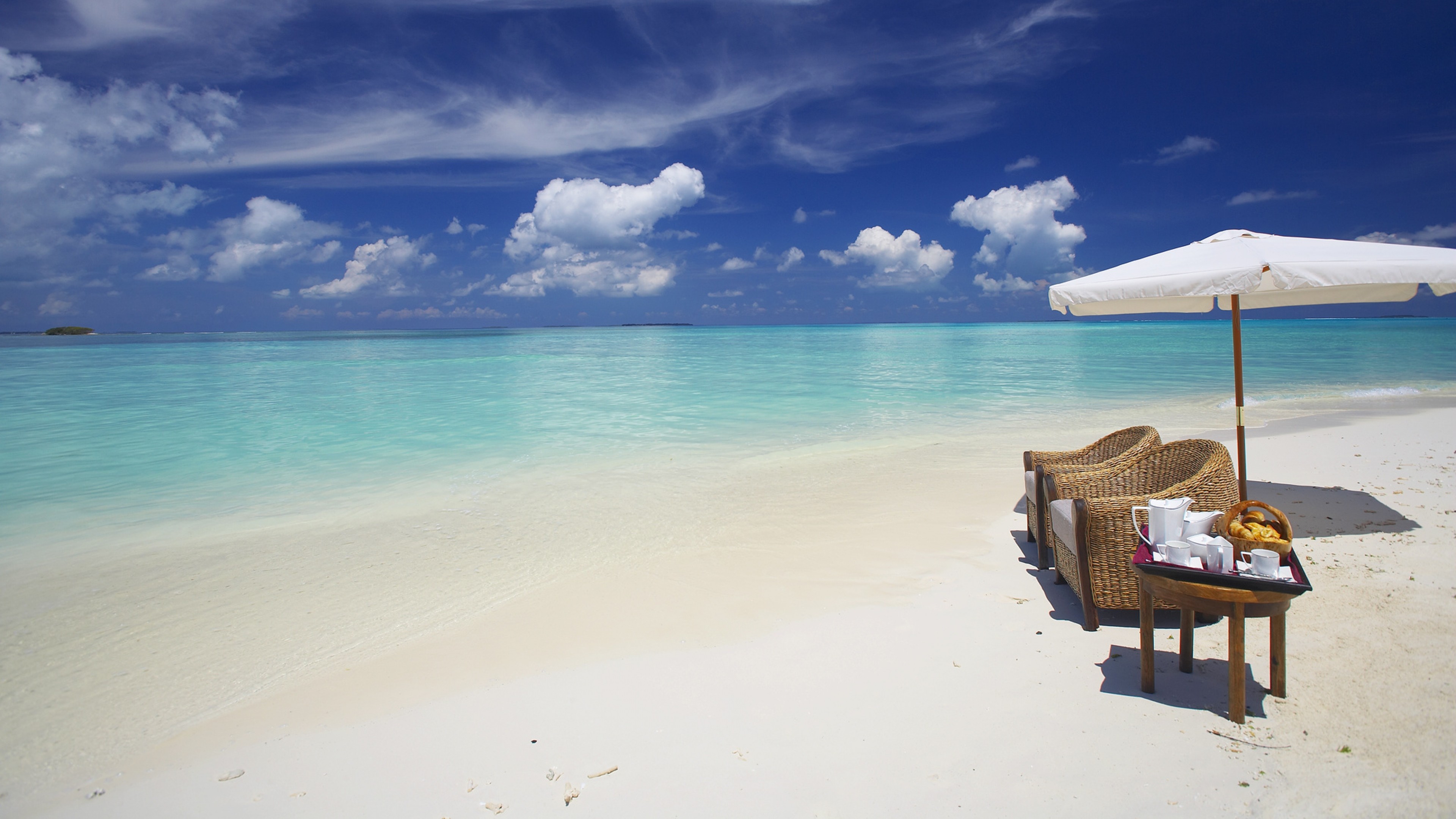 3840x2160  Wallpaper maldives, ocean, beach, sand, water, clouds, umbrella