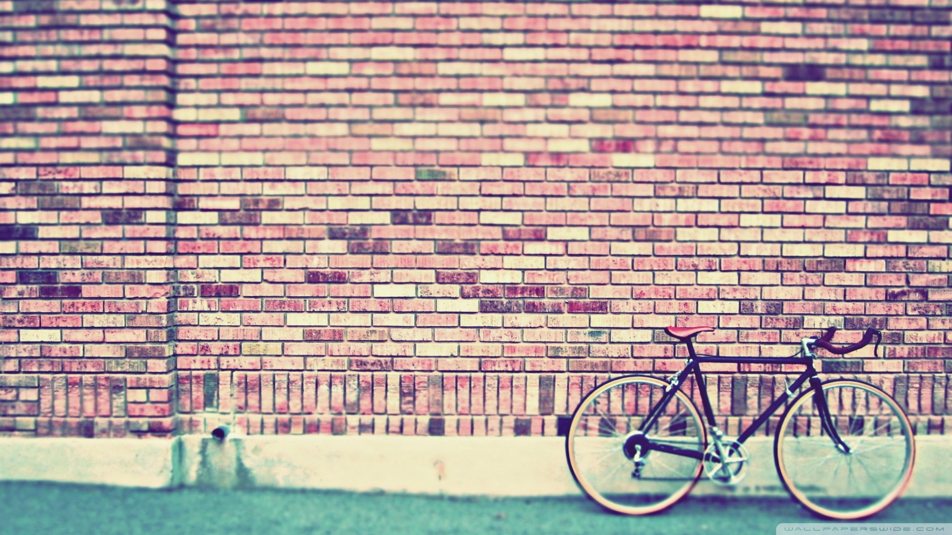 1920x1080 Bicycle by a brick wall wallpaper