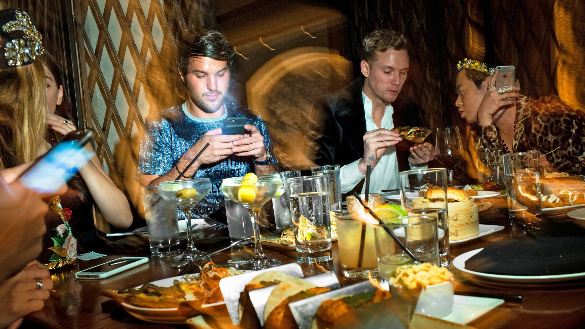 2048x1152 Smartphones at the ready, from left, Andrew Warren, Barron Hilton and Ezra  J. William with friends at Vandal in Manhattan. Credit Deidre Schoo for The  New ...