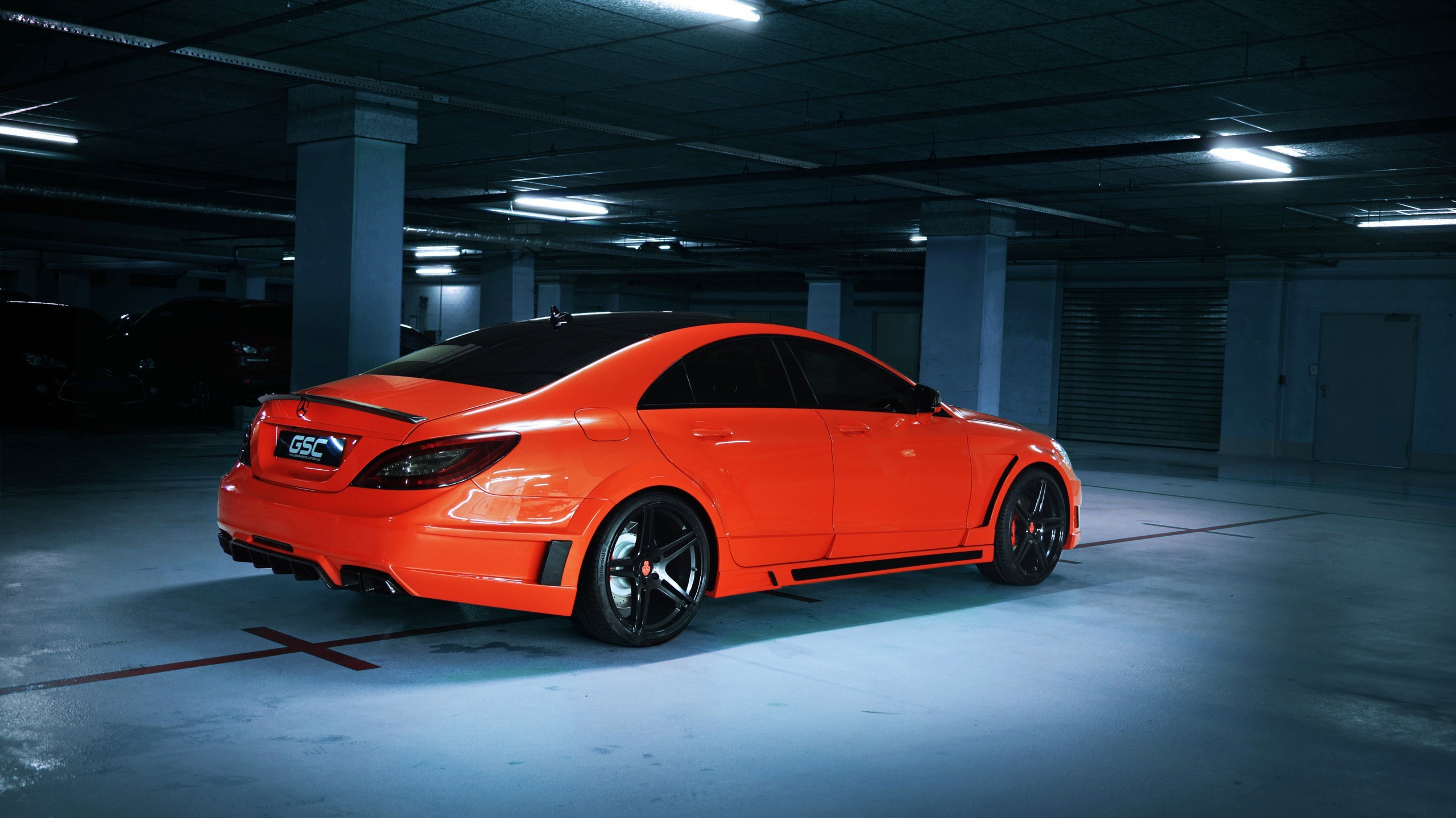 2560x1440 Red Mercedes-Benz in a parking lot in the basement wallpapers and images -  wallpapers, pictures, photos