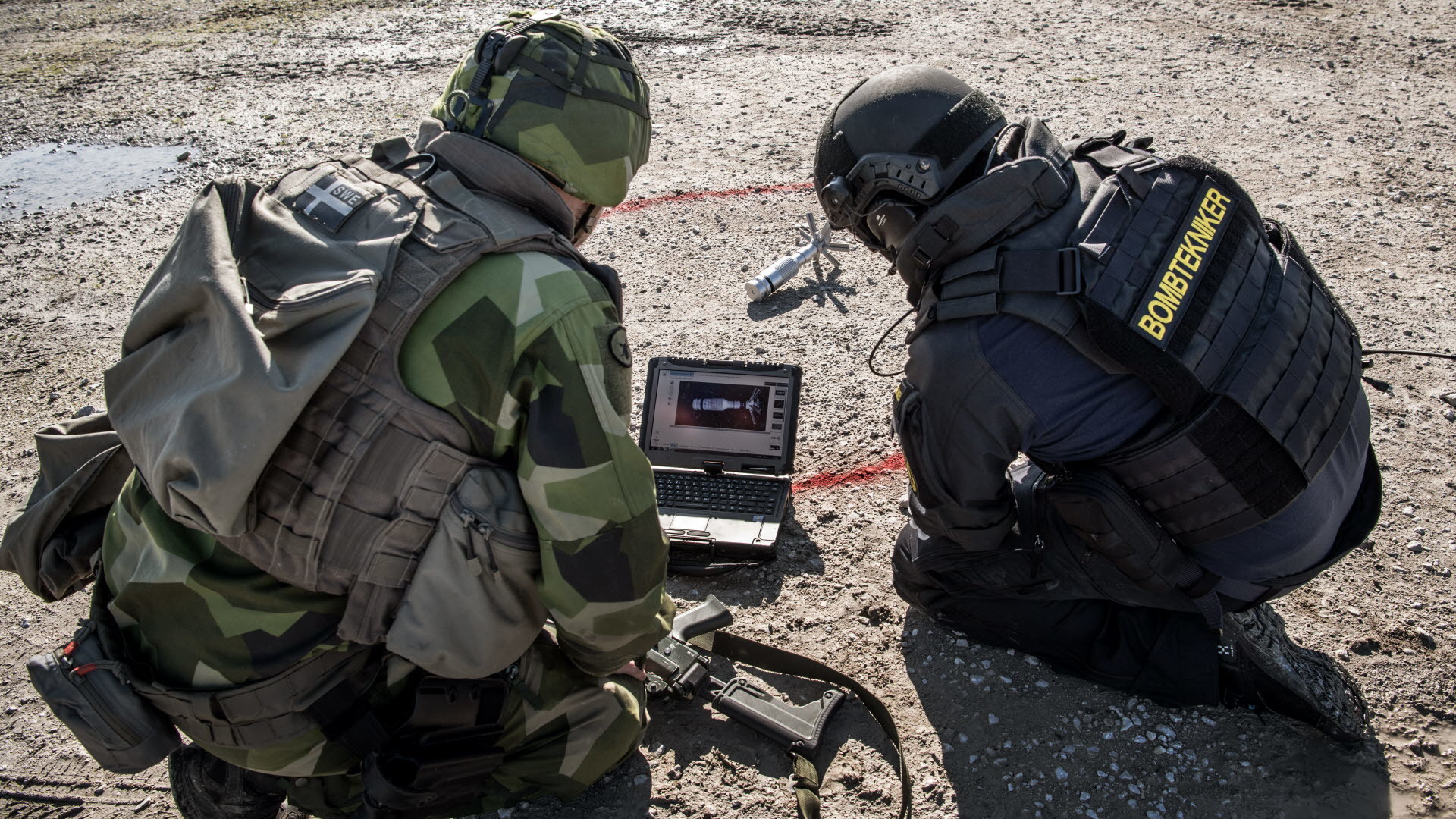 1920x1080 Explosive Ordnance Disposal (EOD) personnel from the Armed Forces and the  Police work on a task together. In the picture, the Armed Forces' EOD  database ...