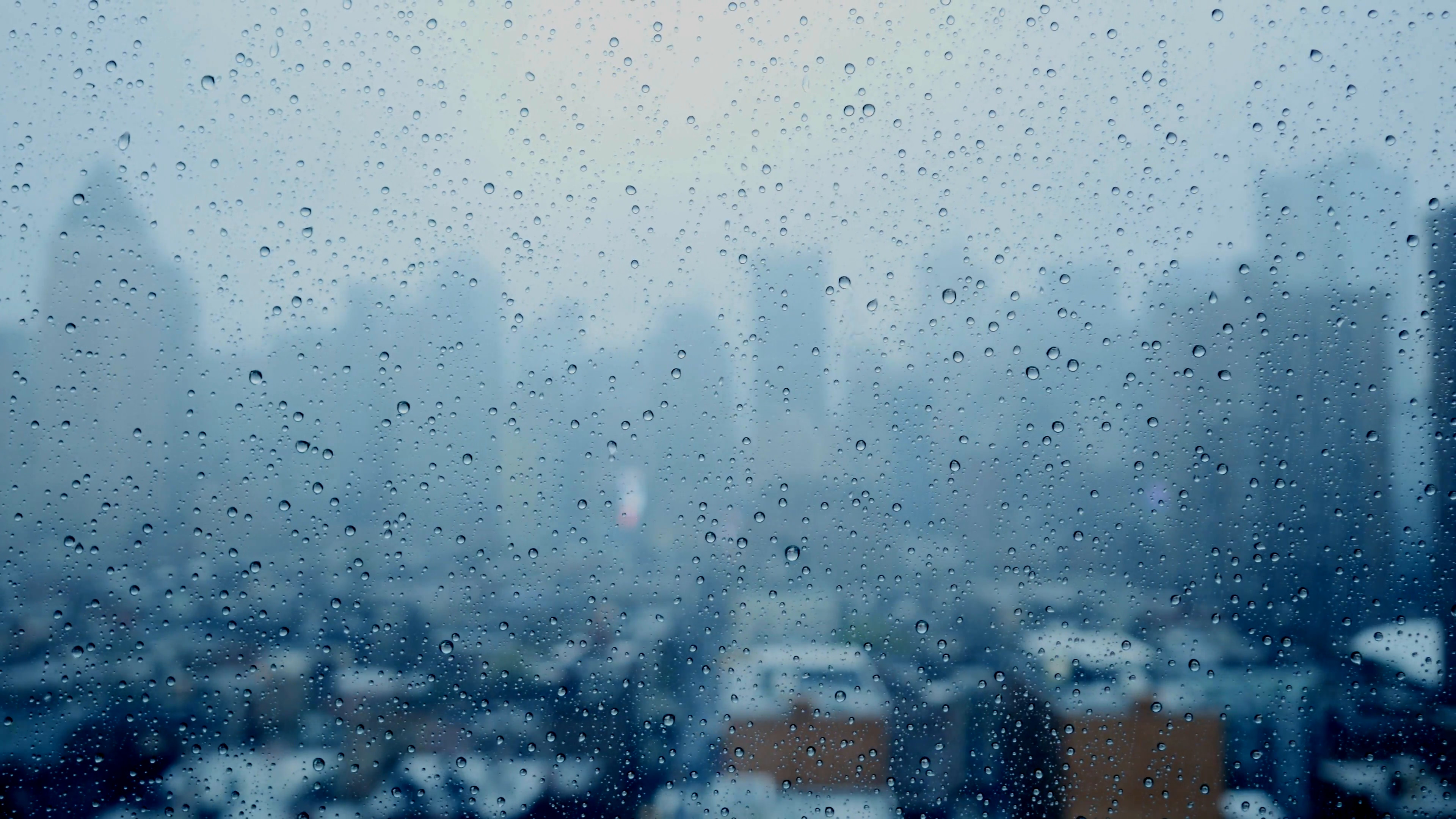 3840x2160 rainy day in the city. rain drops on window glass. depressive mood  background Stock Video Footage - VideoBlocks