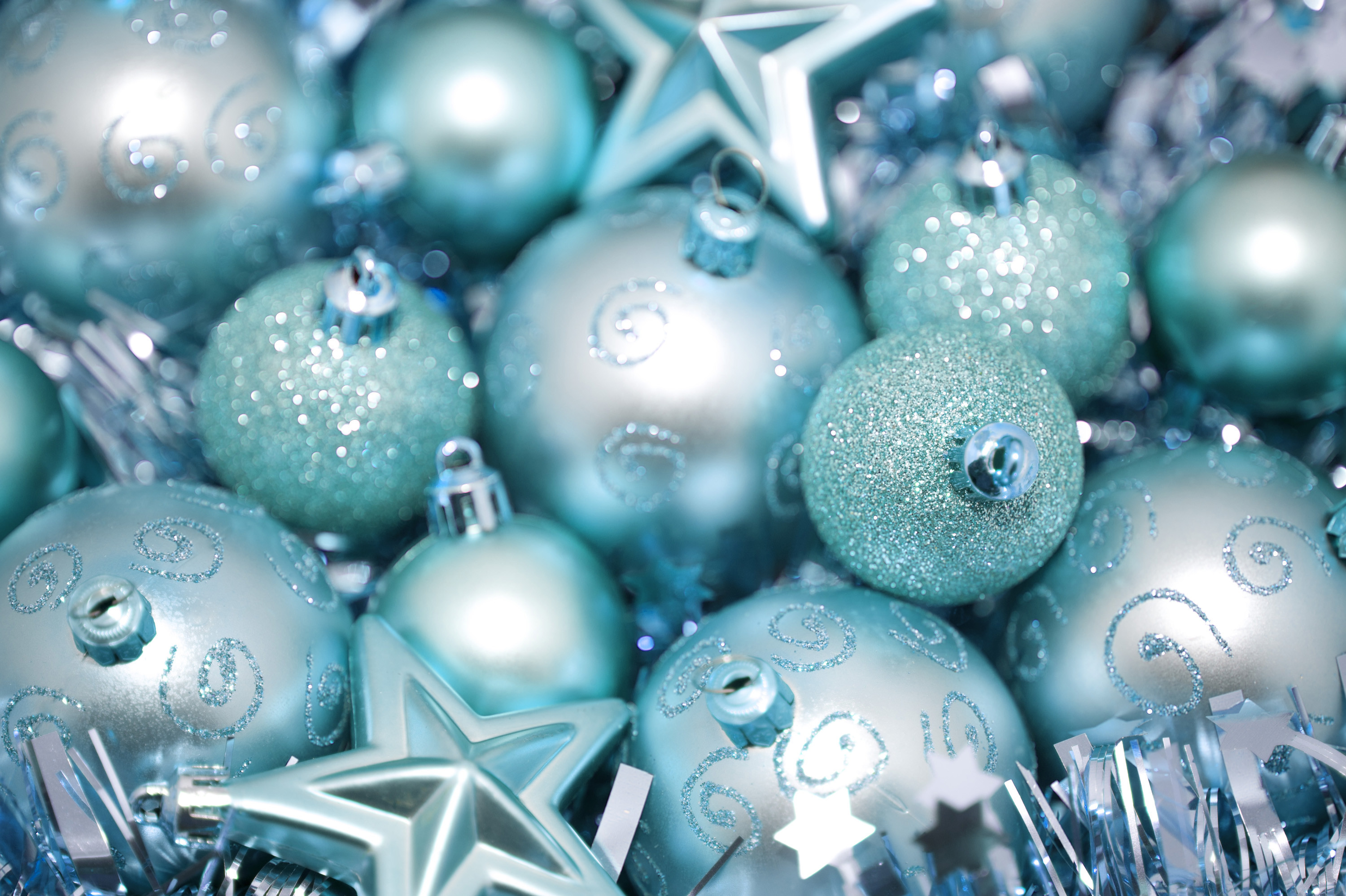 3000x1996 Cyan blue Christmas bauble and star background for your seasonal greetings