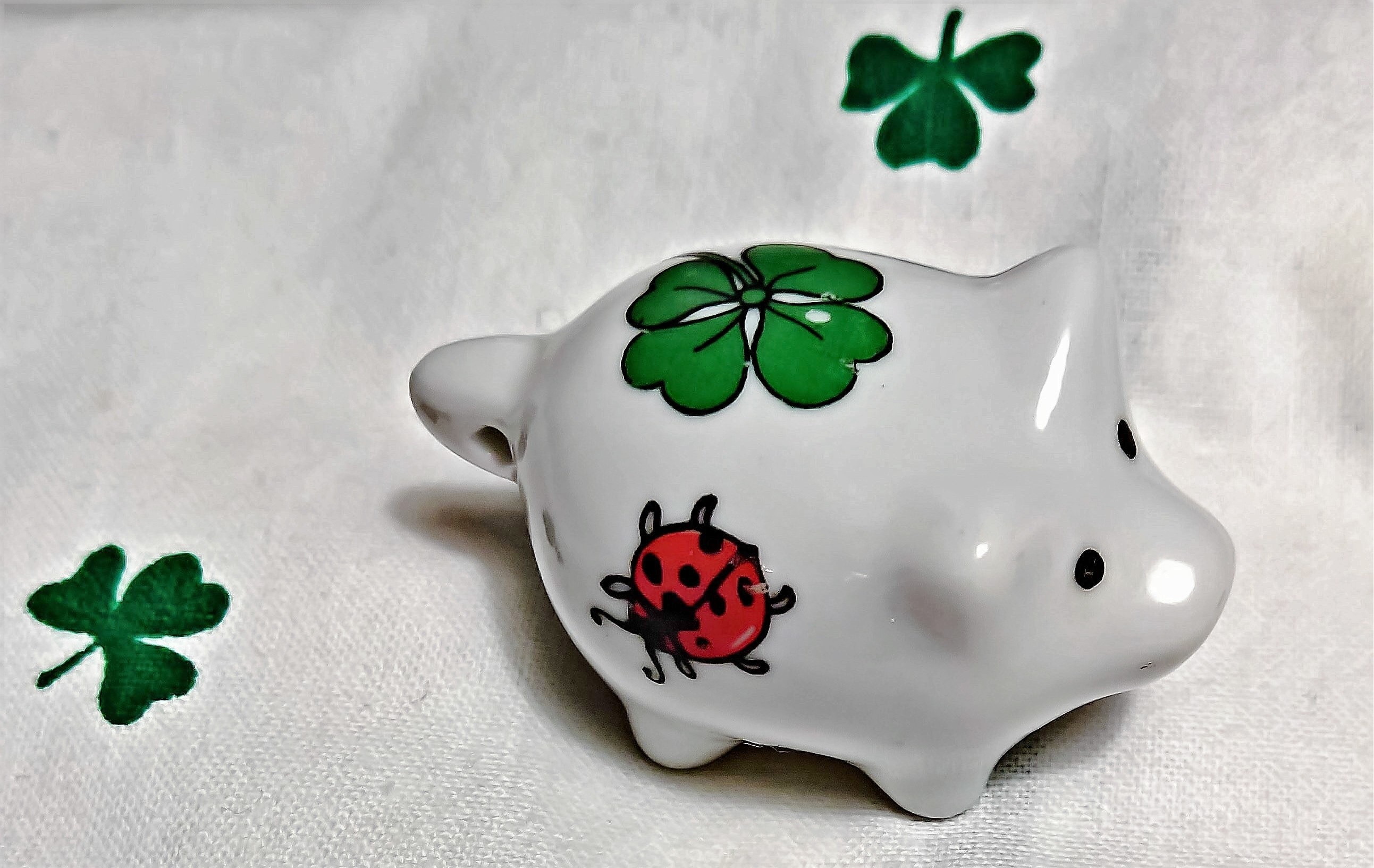 2585x1633 white green and red lady bug and 4 leaf clover pig ceramic figurine preview