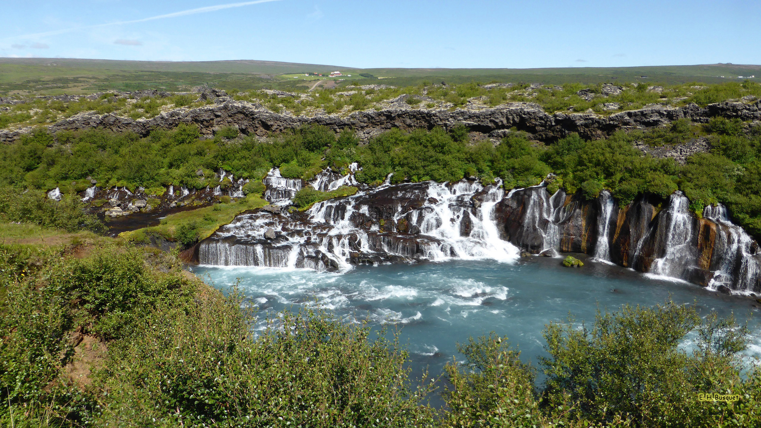 2560x1440 HD wallpaper with the famous Hraunfossar waterfalls.