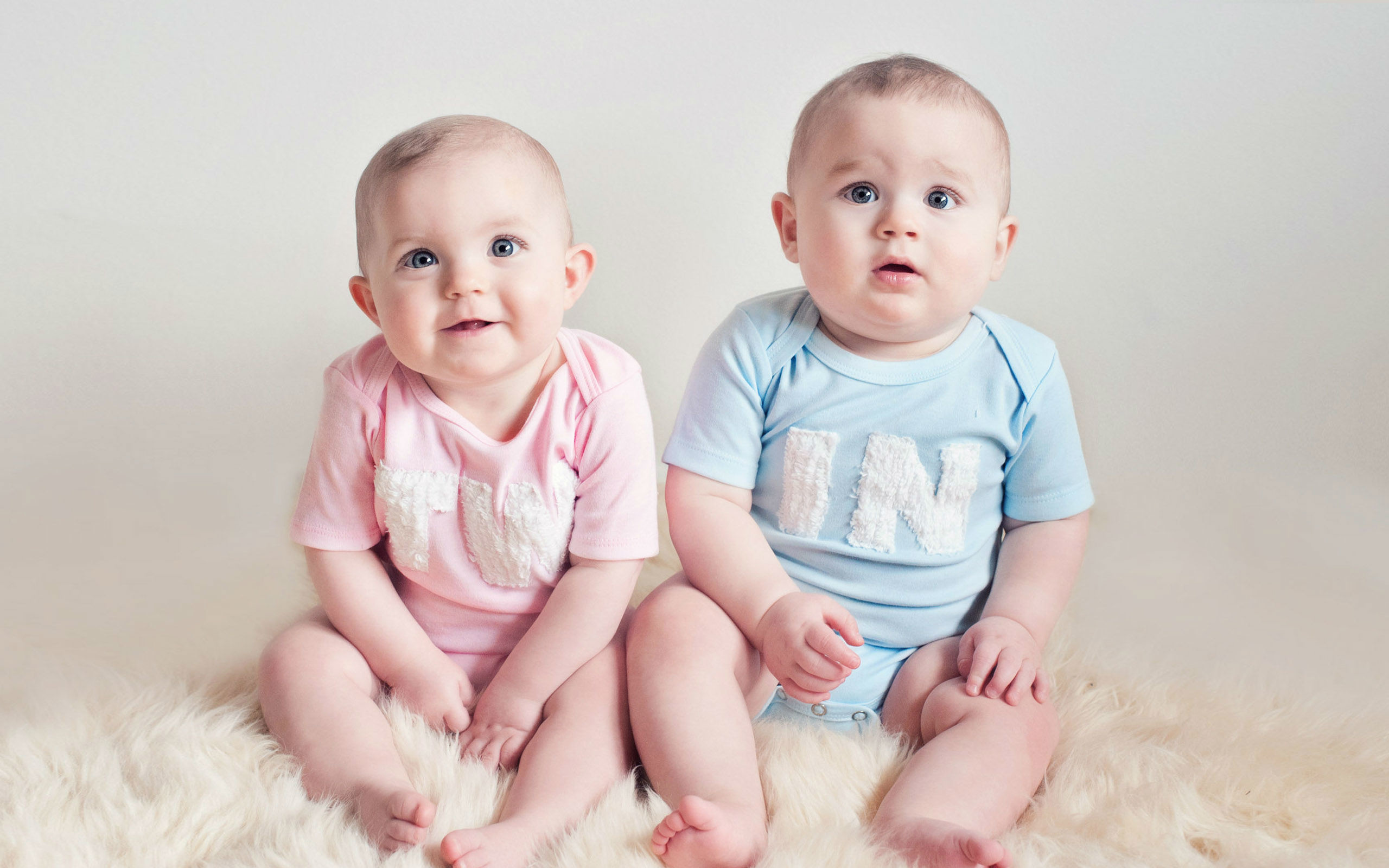 2560x1600 Cute Baby Twins Wallpaper