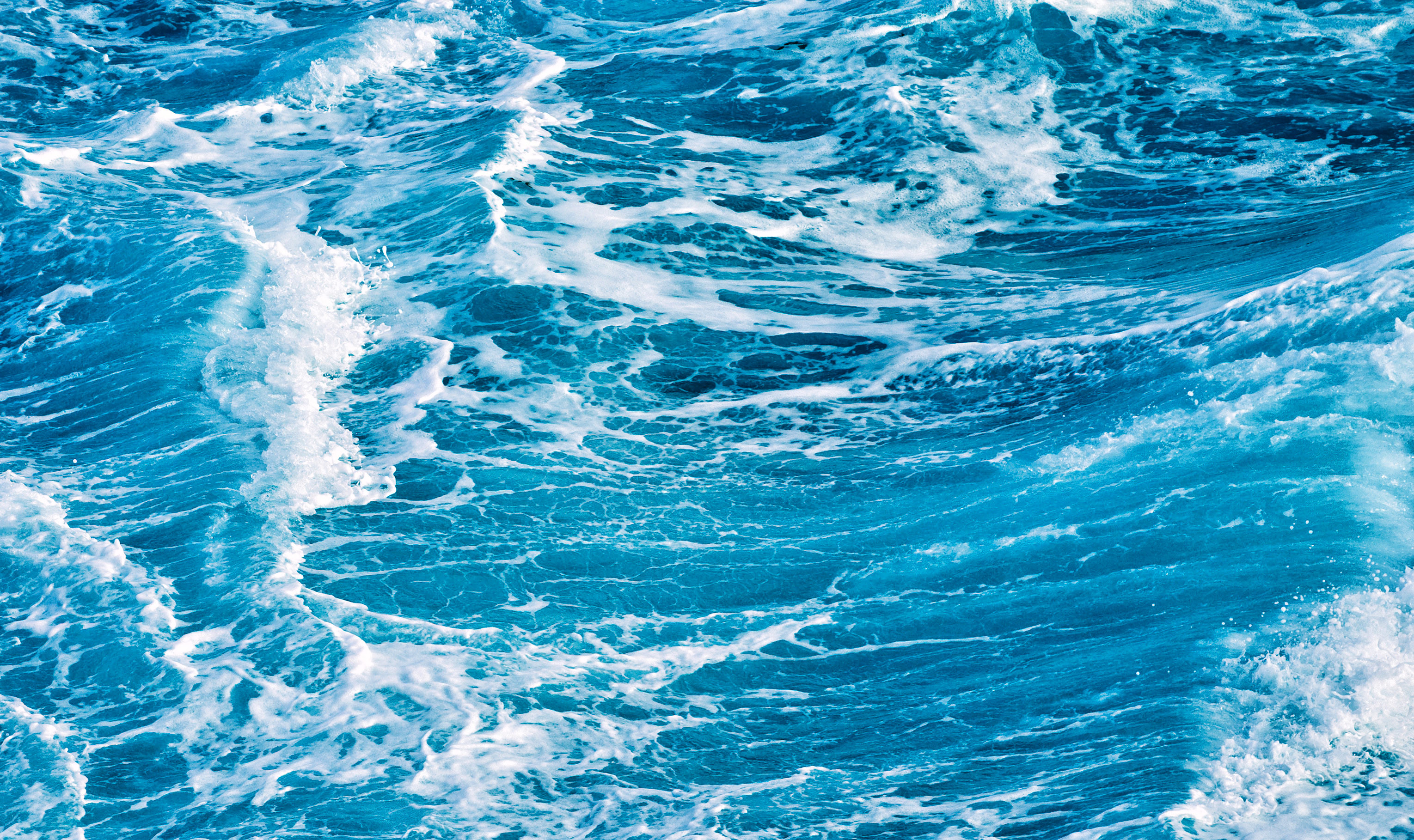 3059x1818 Blue background photo of some ocean waves