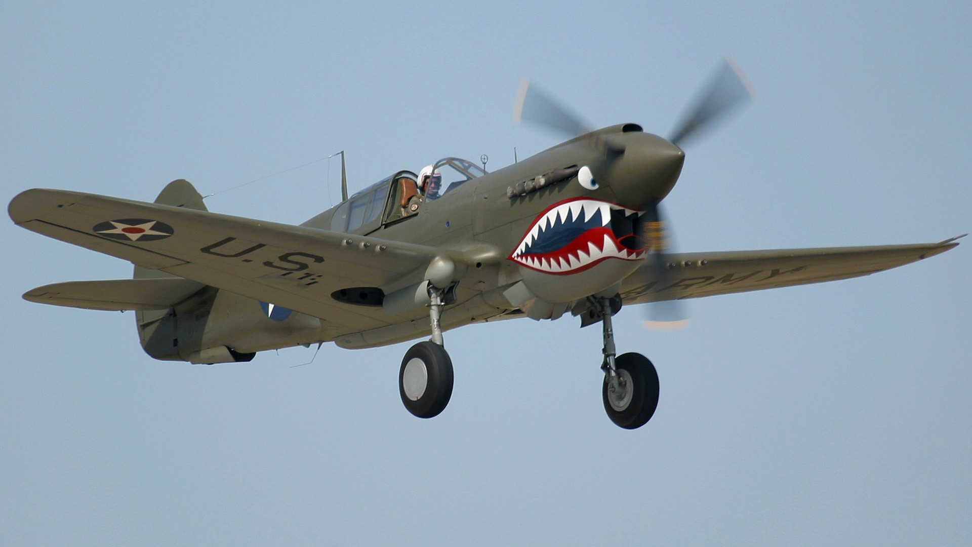 1920x1080 P40 Warhawk photographed at the Oshkosh AirVenture 2002 airshow using a  Canon D60 digital camera and ...