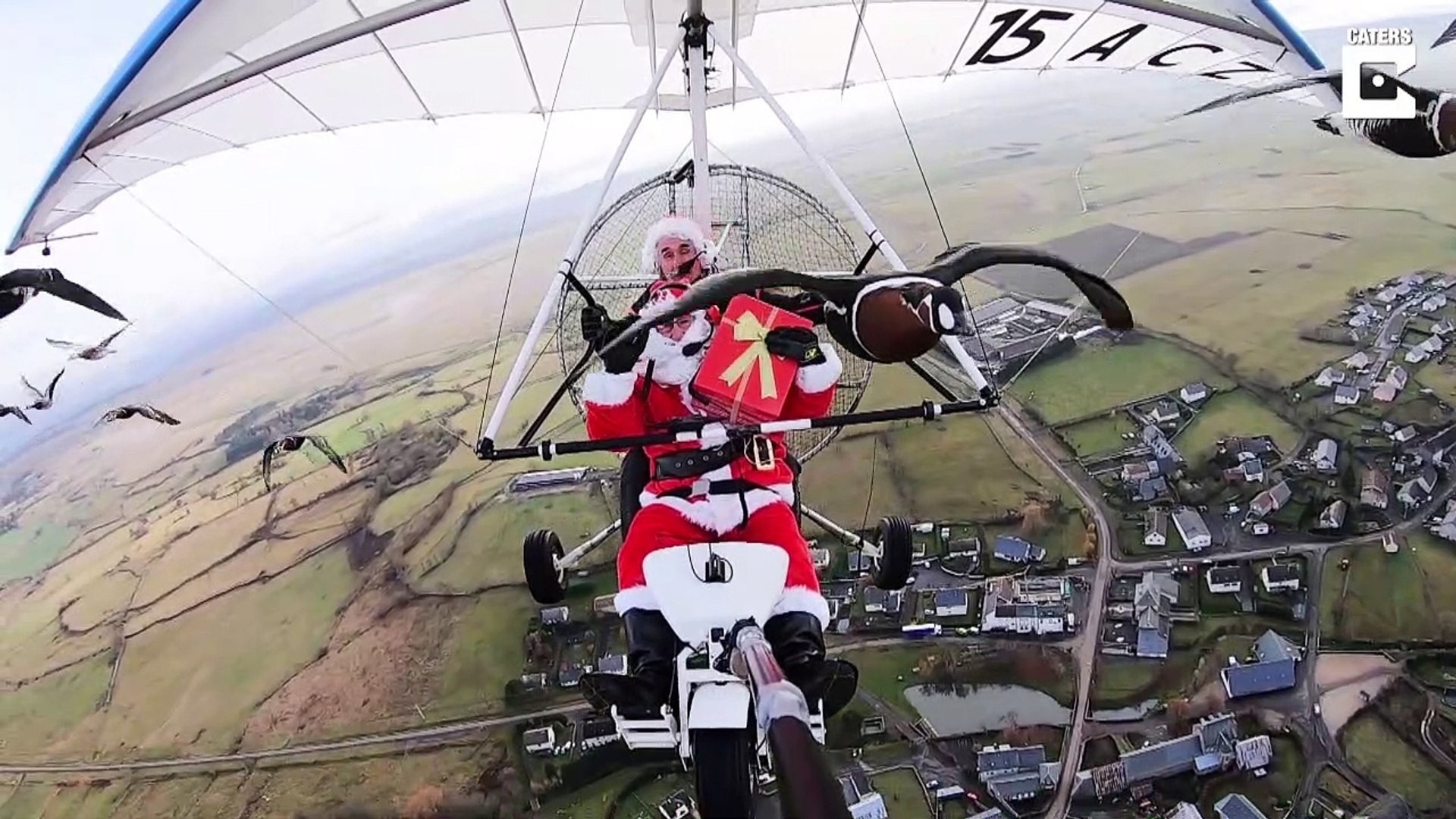 1920x1080 Santa joined on microlight flight with giant v of flying geese