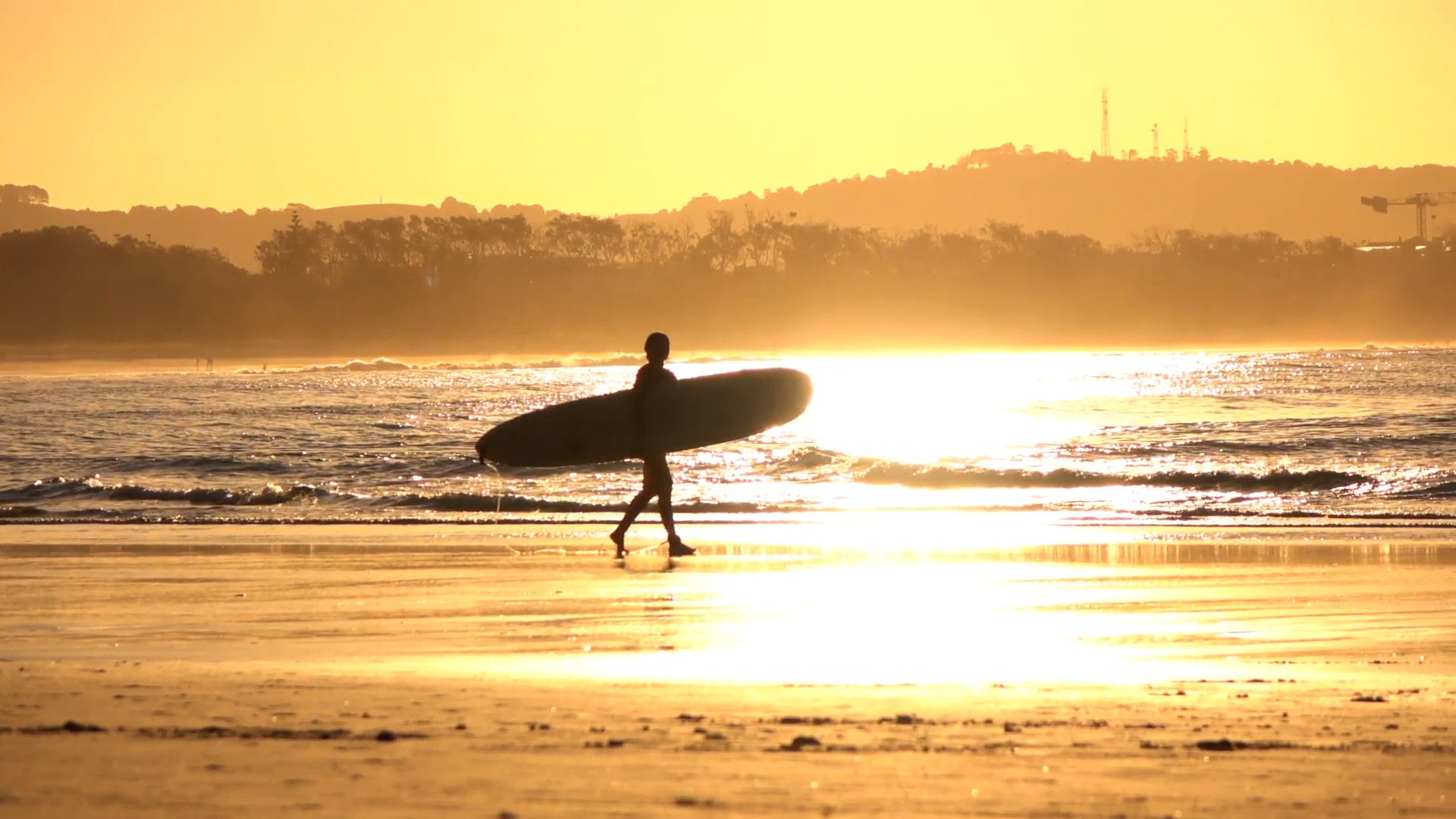 1920x1080 SLOW MOTION: Unrecognizable surfer girl carrying longboard surf at golden  sunset Stock Video Footage - VideoBlocks
