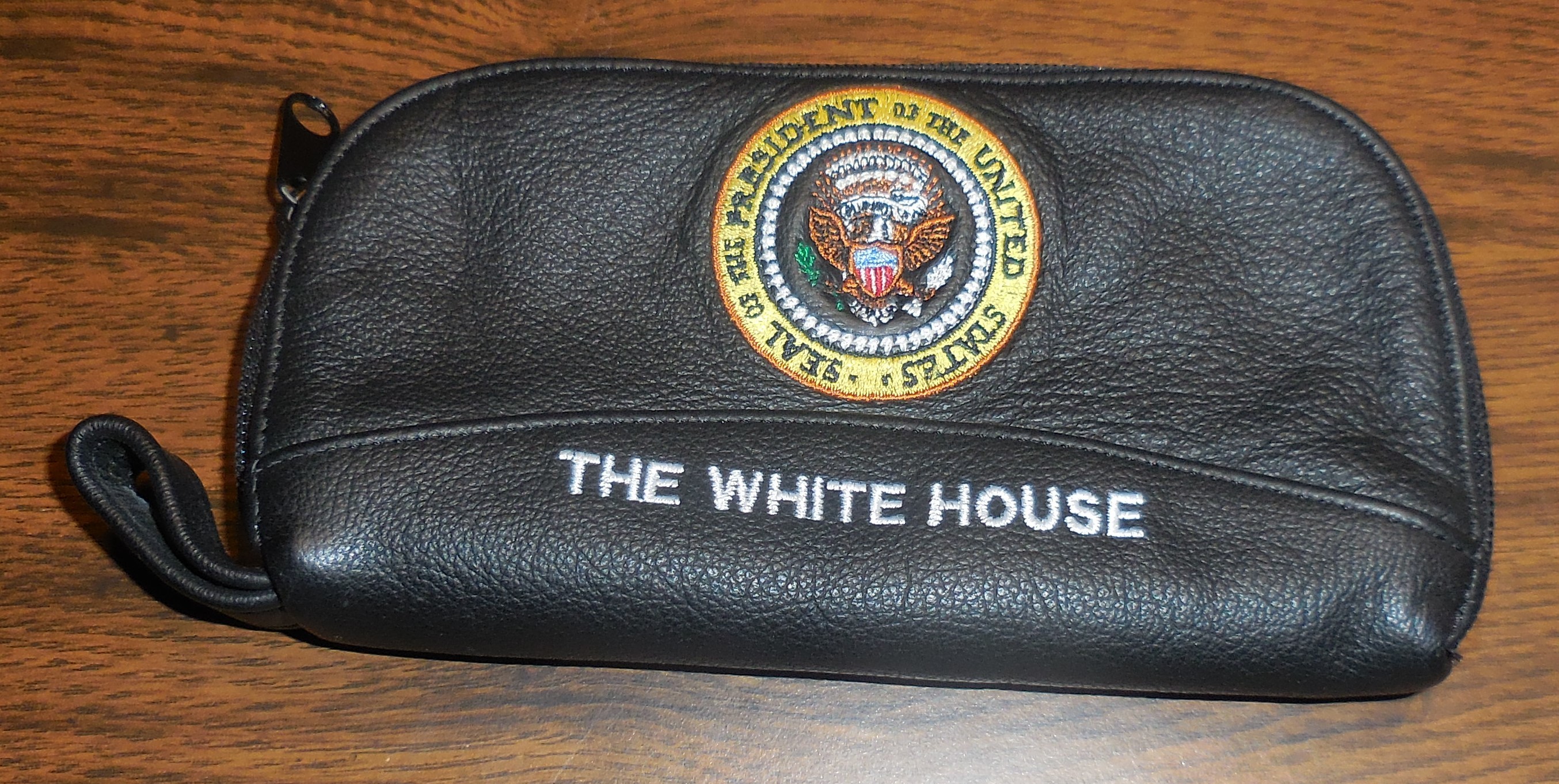 2708x1362 This leather Bag in embroidered with a full color Presidential Seal and the  words “The White House” Brown or Black $100.00 each