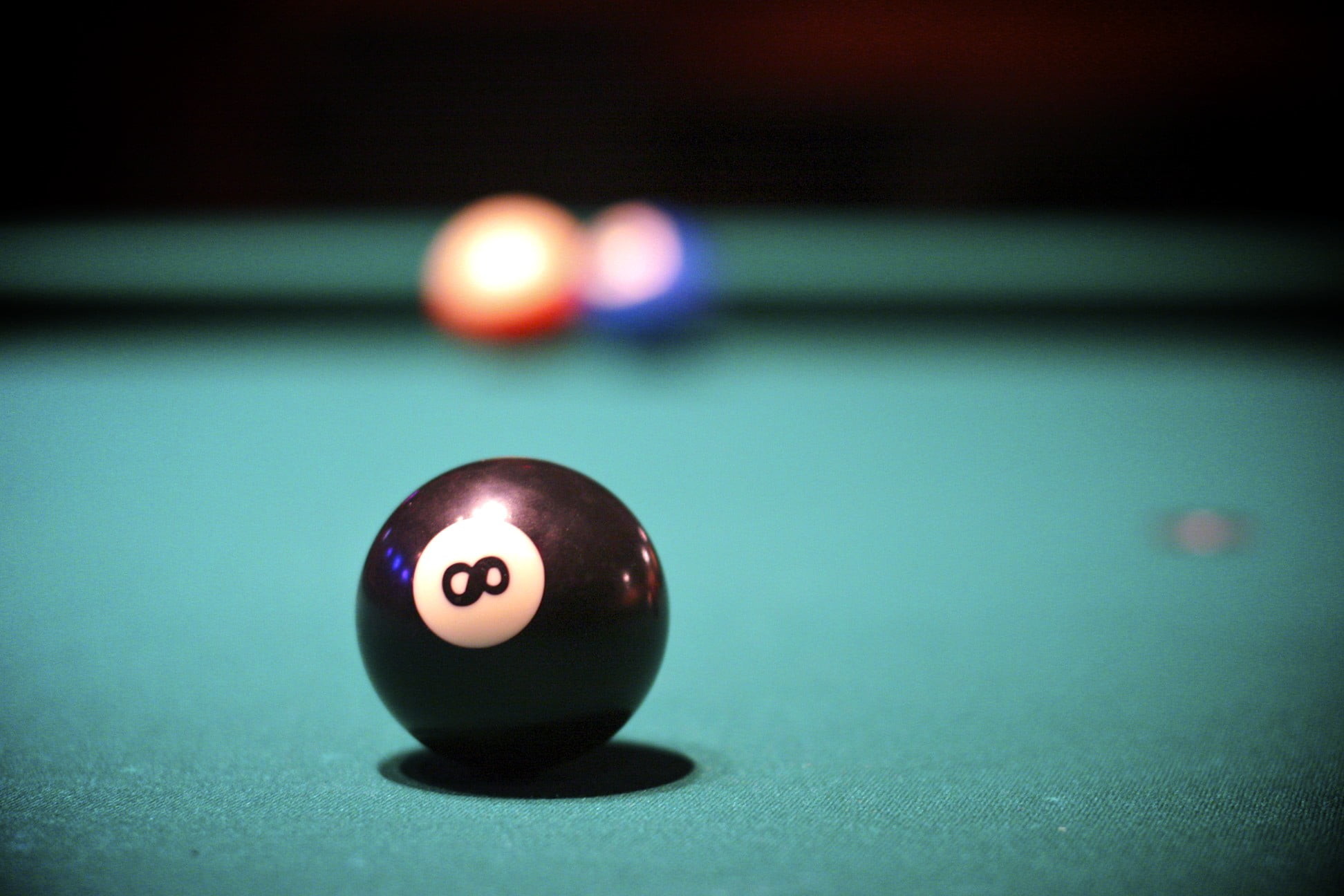 1944x1296 selective focus photography of 8 billiard ball on table