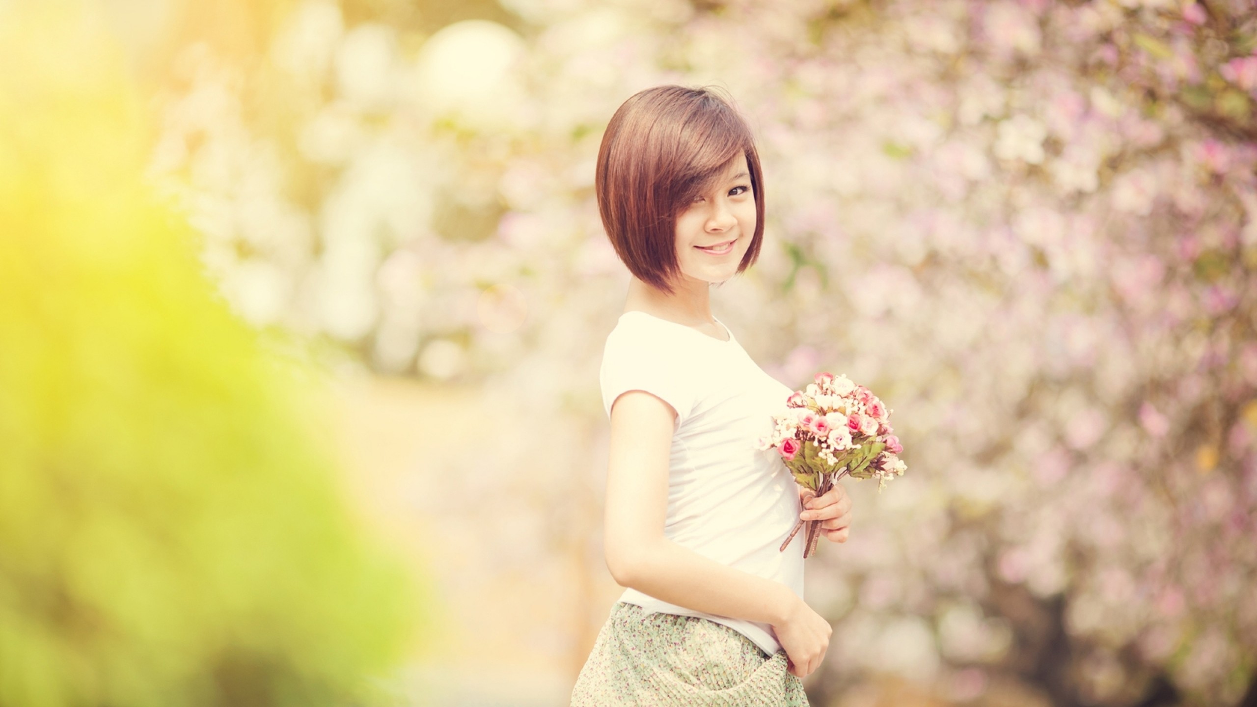 2560x1440 Preview wallpaper spring, girl, asian, flashing, bokeh, smile, flowers  